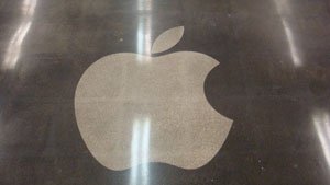 Apple logo on a polished surface