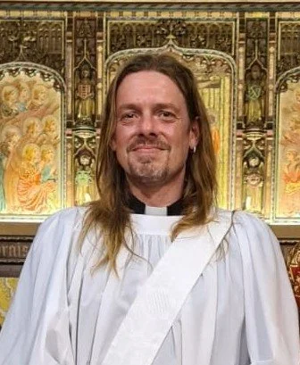 The Reverend Gregor Purdie in the church