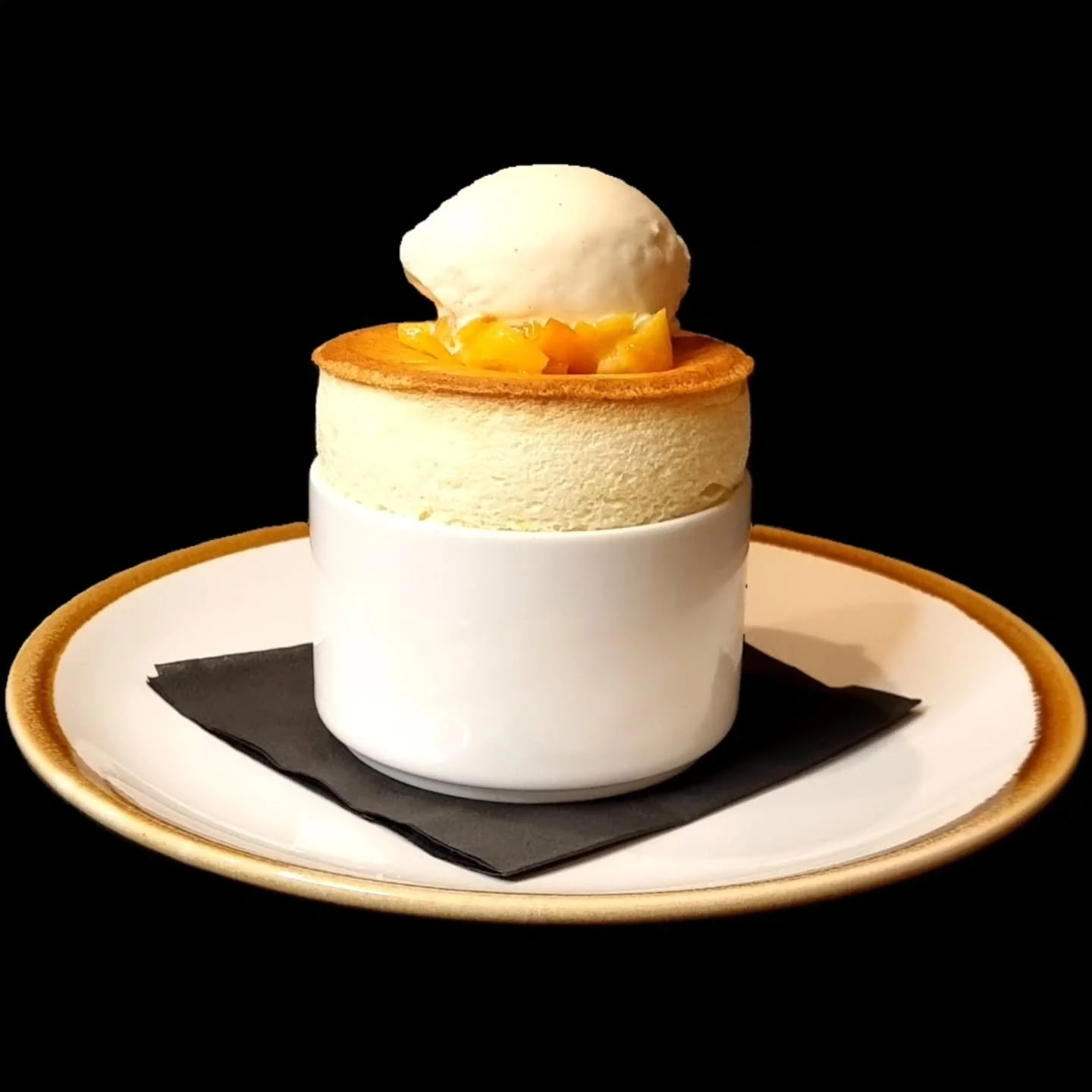 Orange Souffl&eacute;, Orange Marmelade, Vanilla Bean Ice Cream 

#Dessert #DegustationMenu #CulinaryJourney
@koha.cuisine