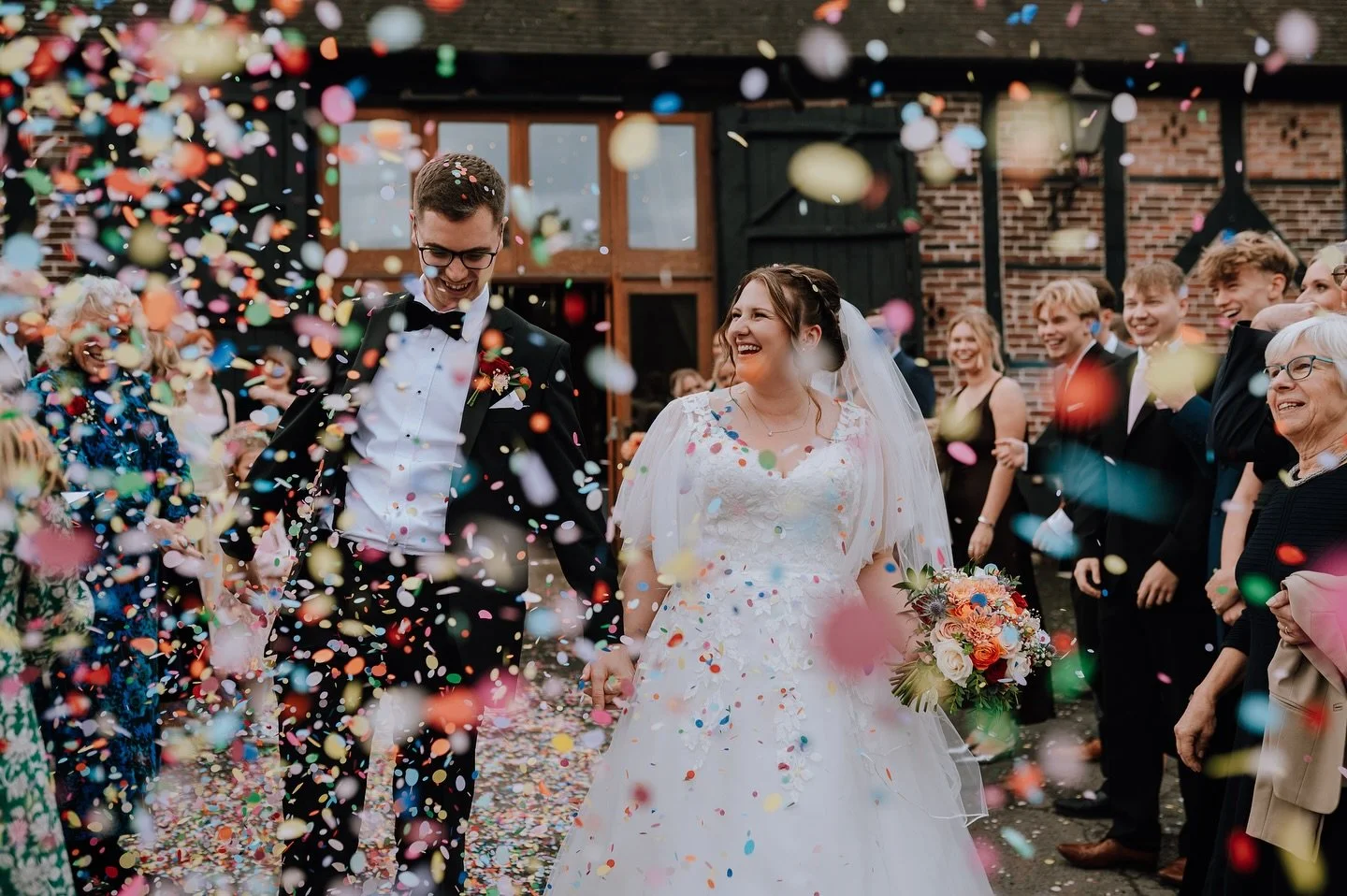 Now that&rsquo;s what we call confetti!!! 🎉 

Mr &amp; Mrs McMillan ✨ @hundredhouseweddings 

@papercirclesconfetti 
@blush.floristry 
@hundredhouseweddings 
@wed2b 
@peterposhsuit 
@nickboyweddingvideo 
@colettebaileyfreelancemua 
@linzi.loops