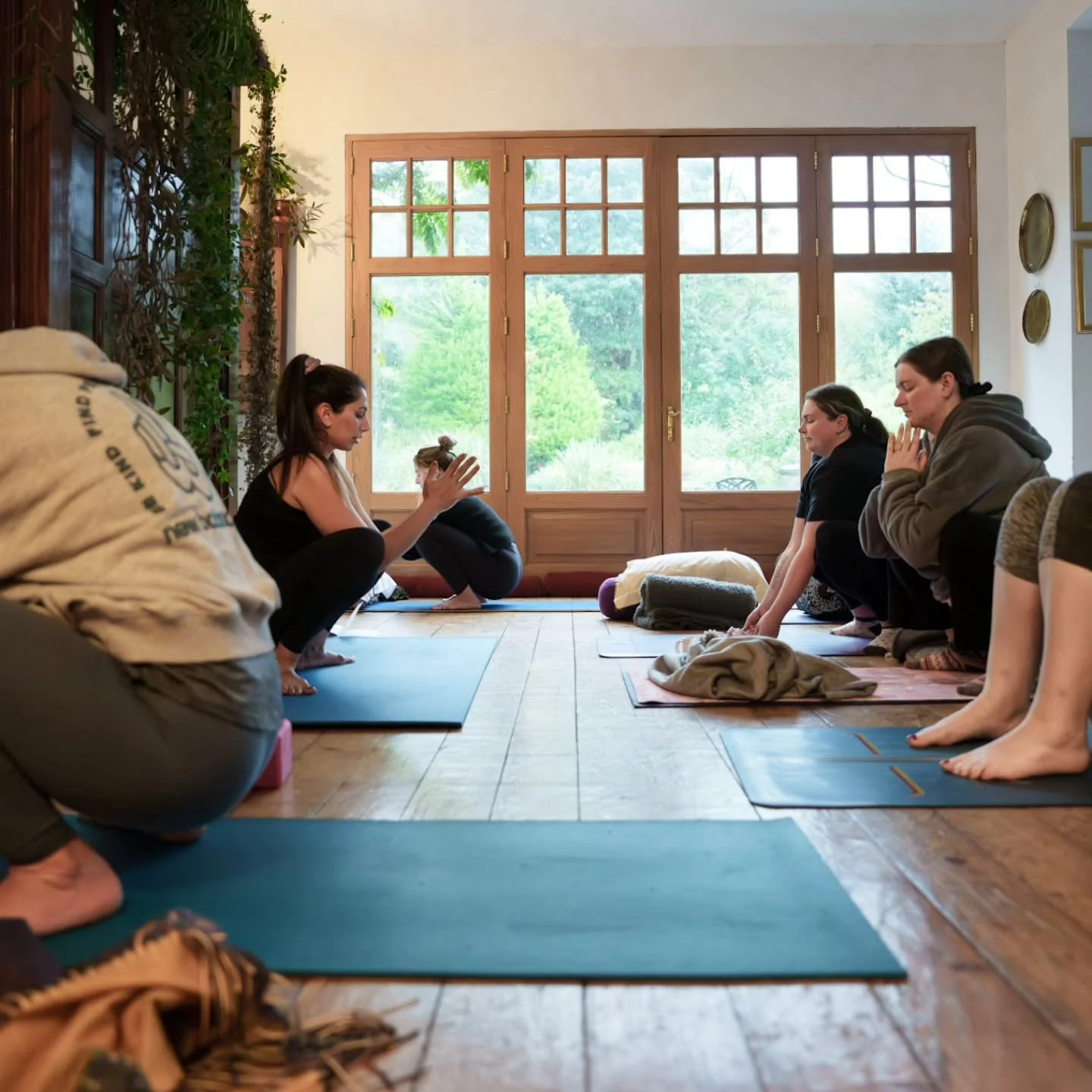 Can you see it? 

How we are all making different shapes, in our asana practice? 

Sometimes using blocks, pillows, bolsters, straps. Some of us lying down, some of us seated. 

All of us, together. 

This is what I love about retreats. Space and tim