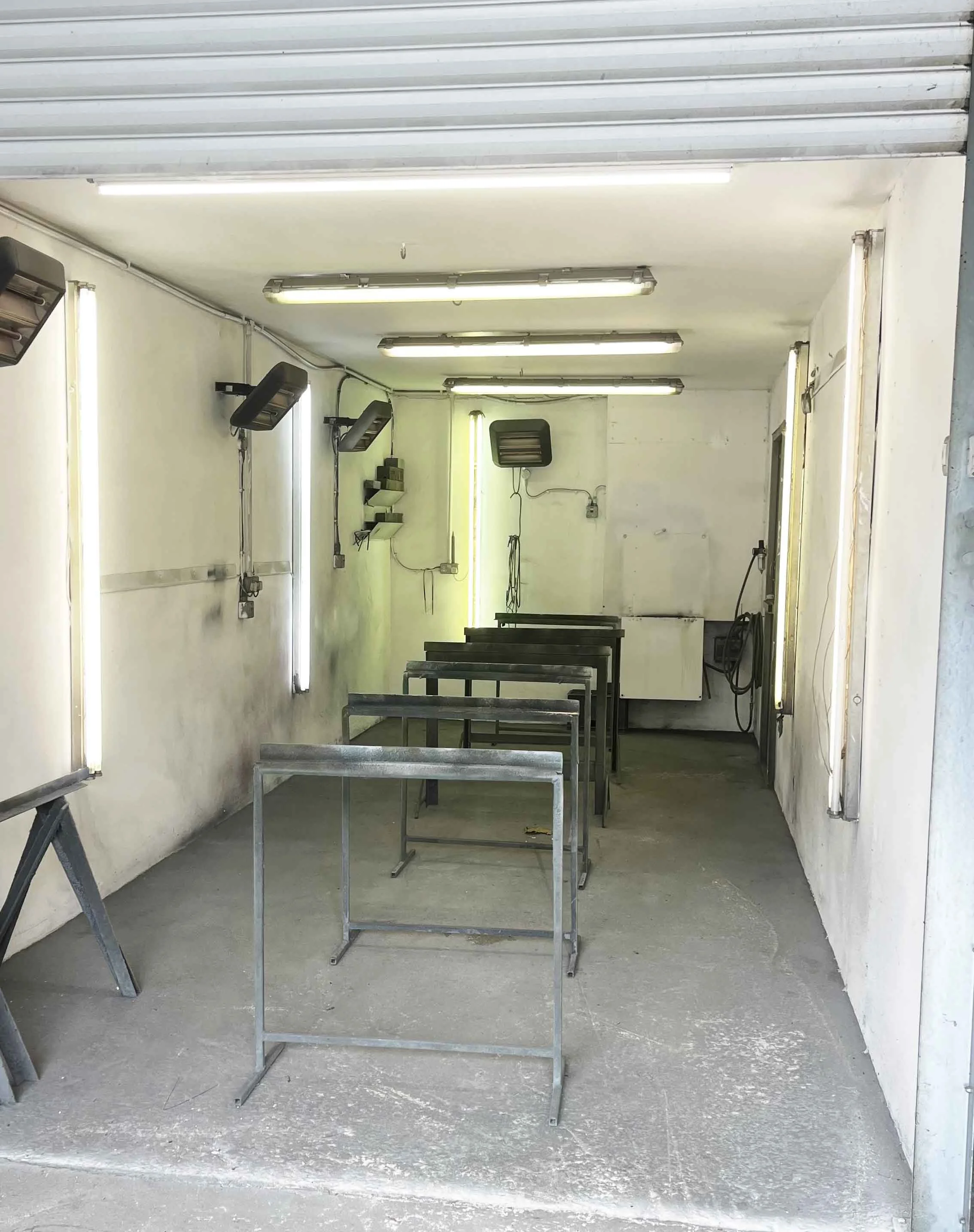 Roller door spray room