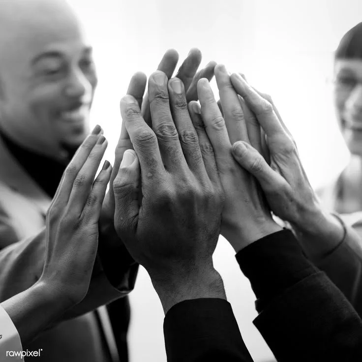 Download premium image of Cheerful business people doing a high five by Felix about hand, people, man, celebration, and adult 1216806.jpeg
