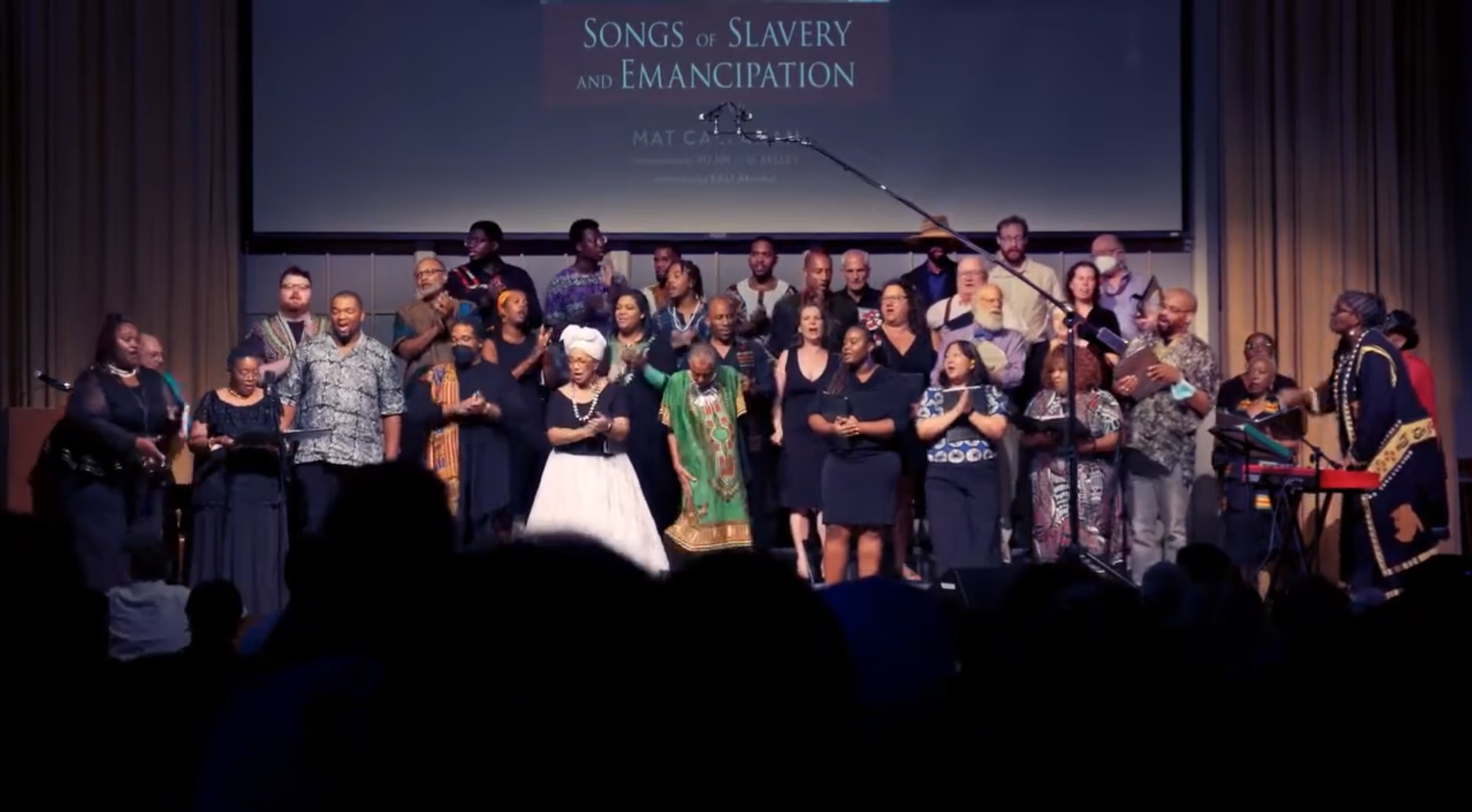Berea choir singing somgs of slavery and emancipation on stage.