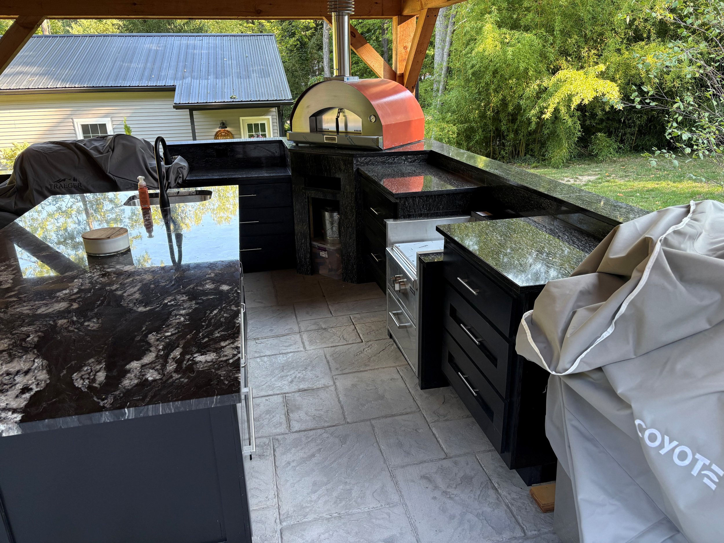 Custom built outdoor kitchen cabinets