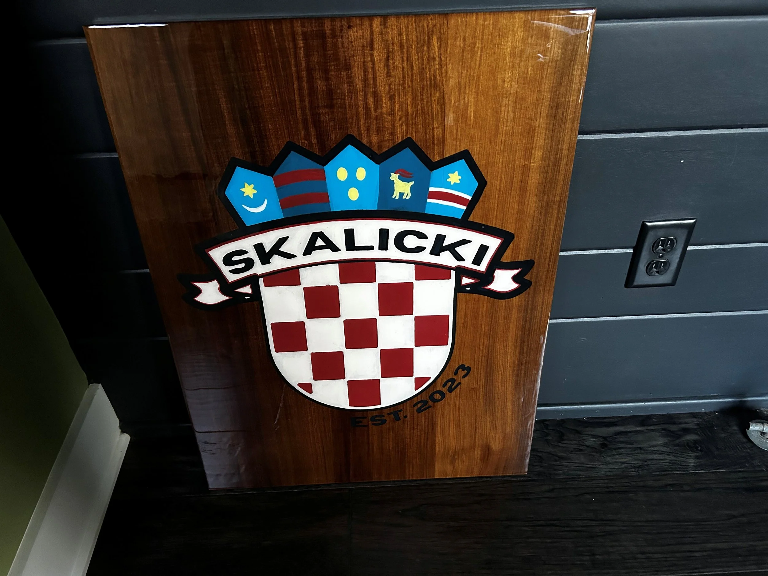 Custom family crest sign finished with epoxy