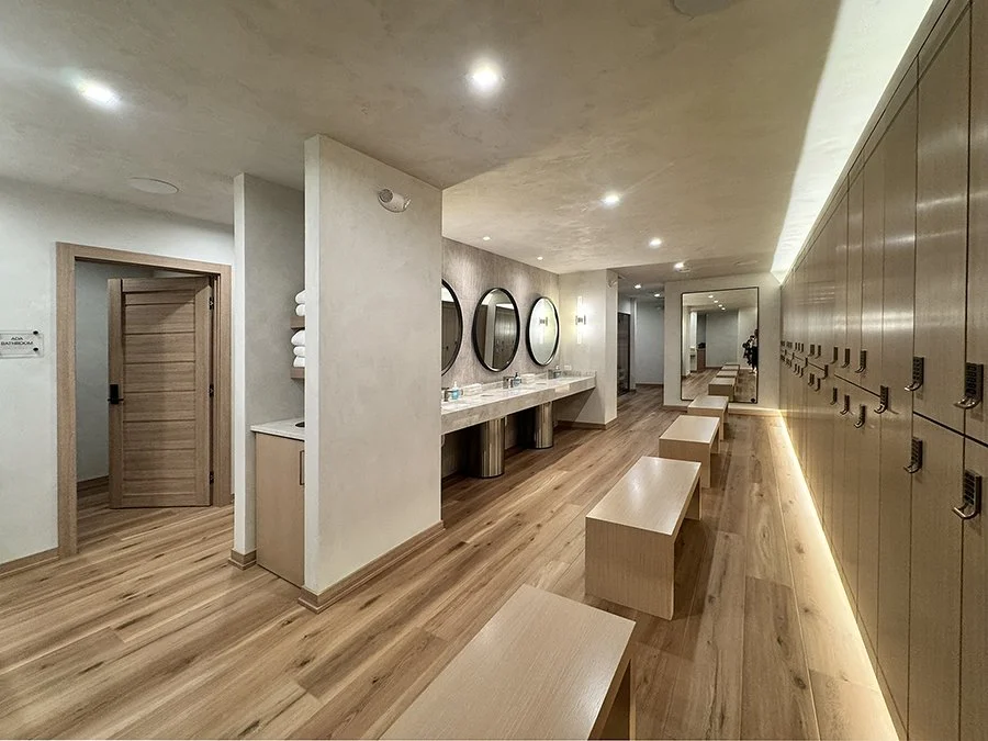Women's elegant and serene locker room at REVIVAL