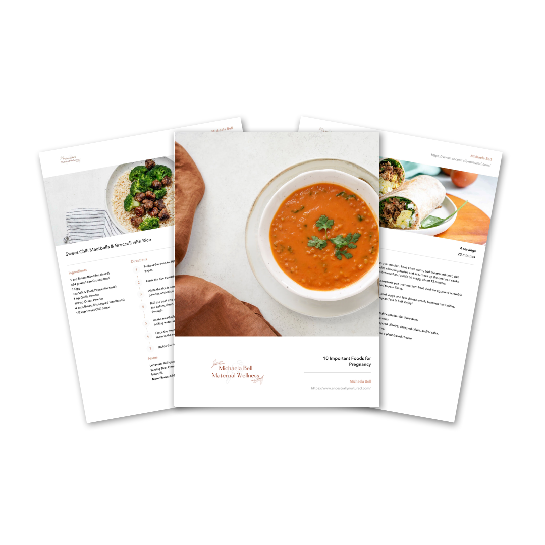 Three printed recipe pages with images of healthy dishes, including a bowl of soup in the center page.