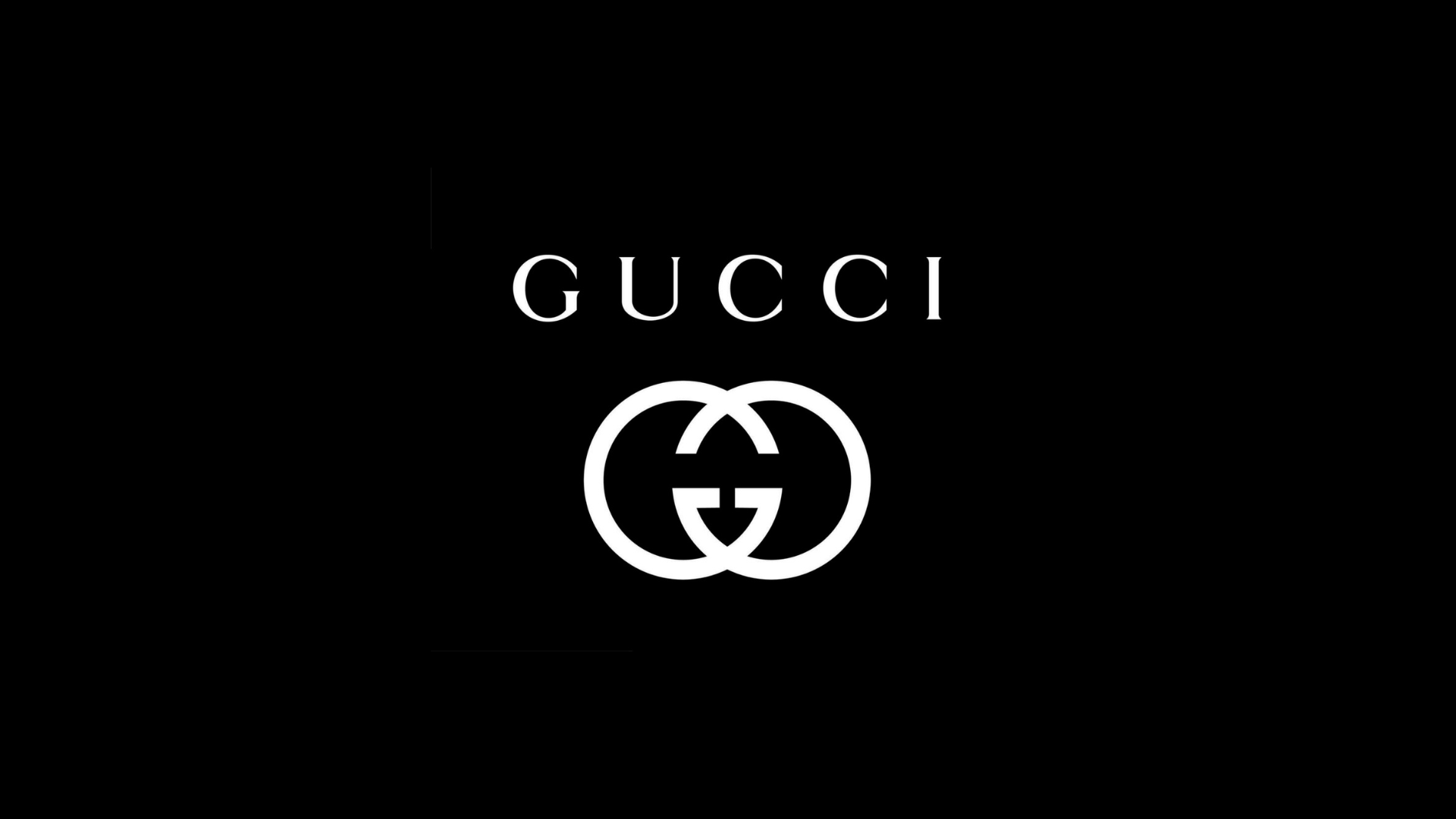 Gucci logo with interlocking G's on black background.