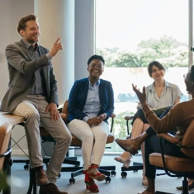 Business leaders meeting in a modern office, representing leadership accountability, executive standards, decision ownership, and performance oversight across teams.