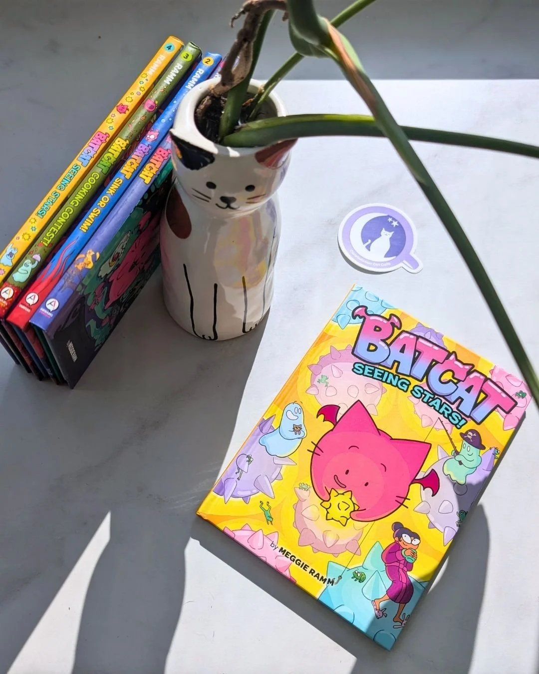 Two things to share today:

✨ Our monstera has officially outgrown its pot and is now attempting to move into the wall. Rent-free, of course.

✨ AND we're giving away two tickets to the Batcat Book Release Party on Tuesday, April 28th at 4:30pm!

Alo