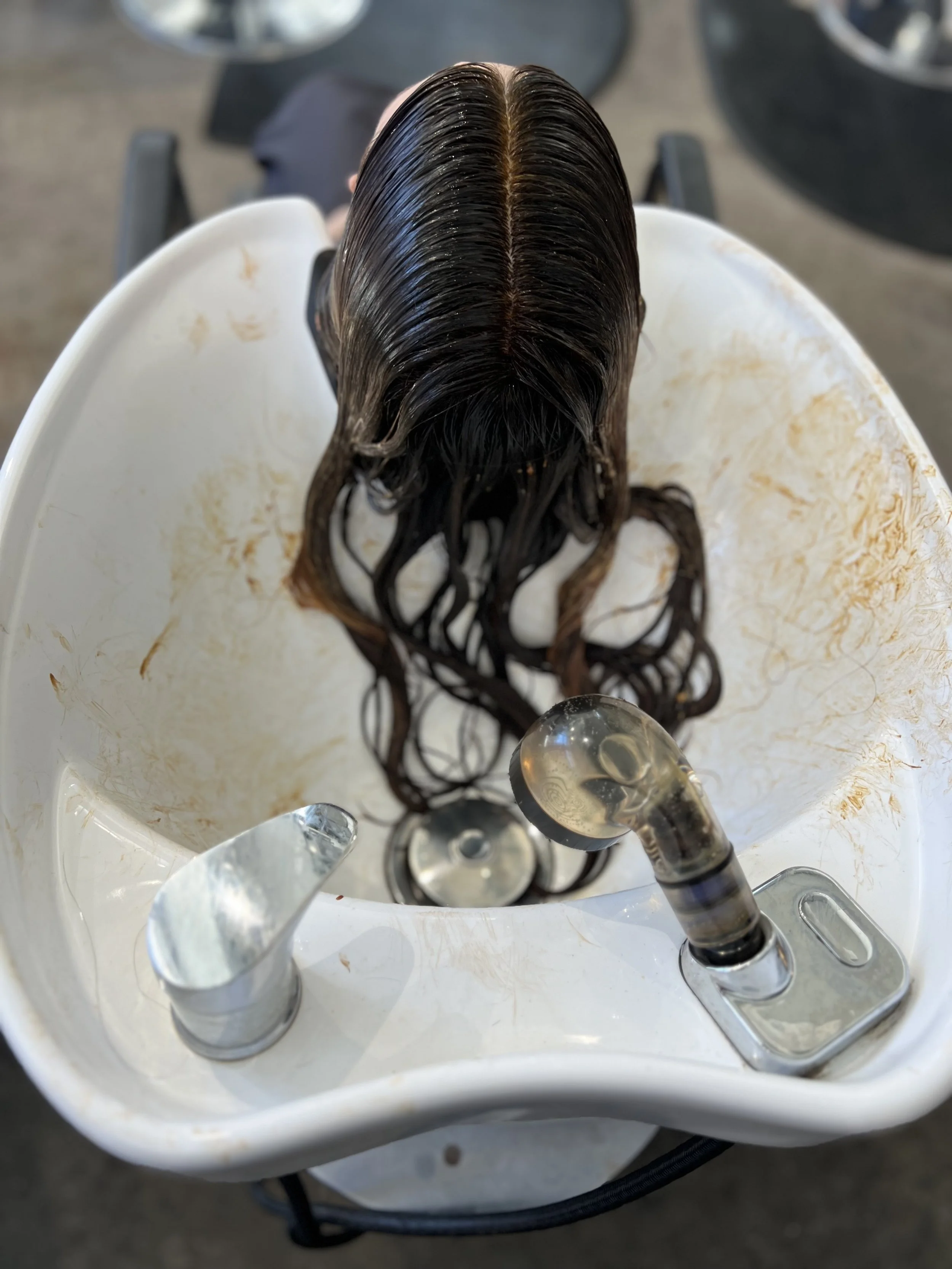Glossy healthy hair after a professional hair gloss treatment at Gem House Salon in Greenpoint Brooklyn