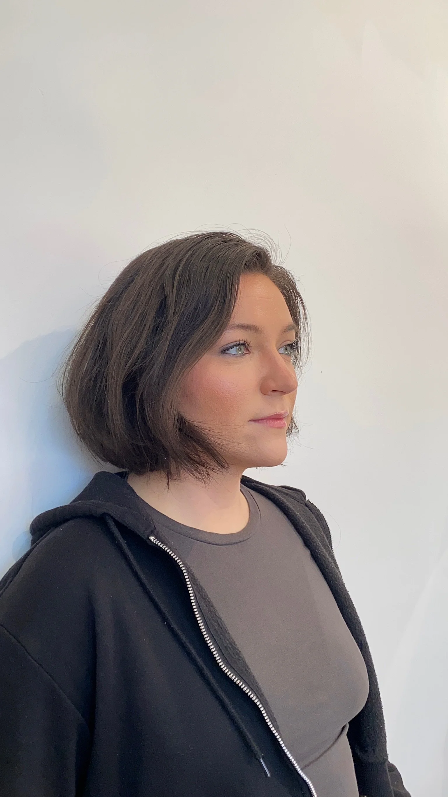 Before photo of brunette hair before platinum color transformation at Gem House Salon in Greenpoint Brooklyn near Williamsburg and Long Island City.