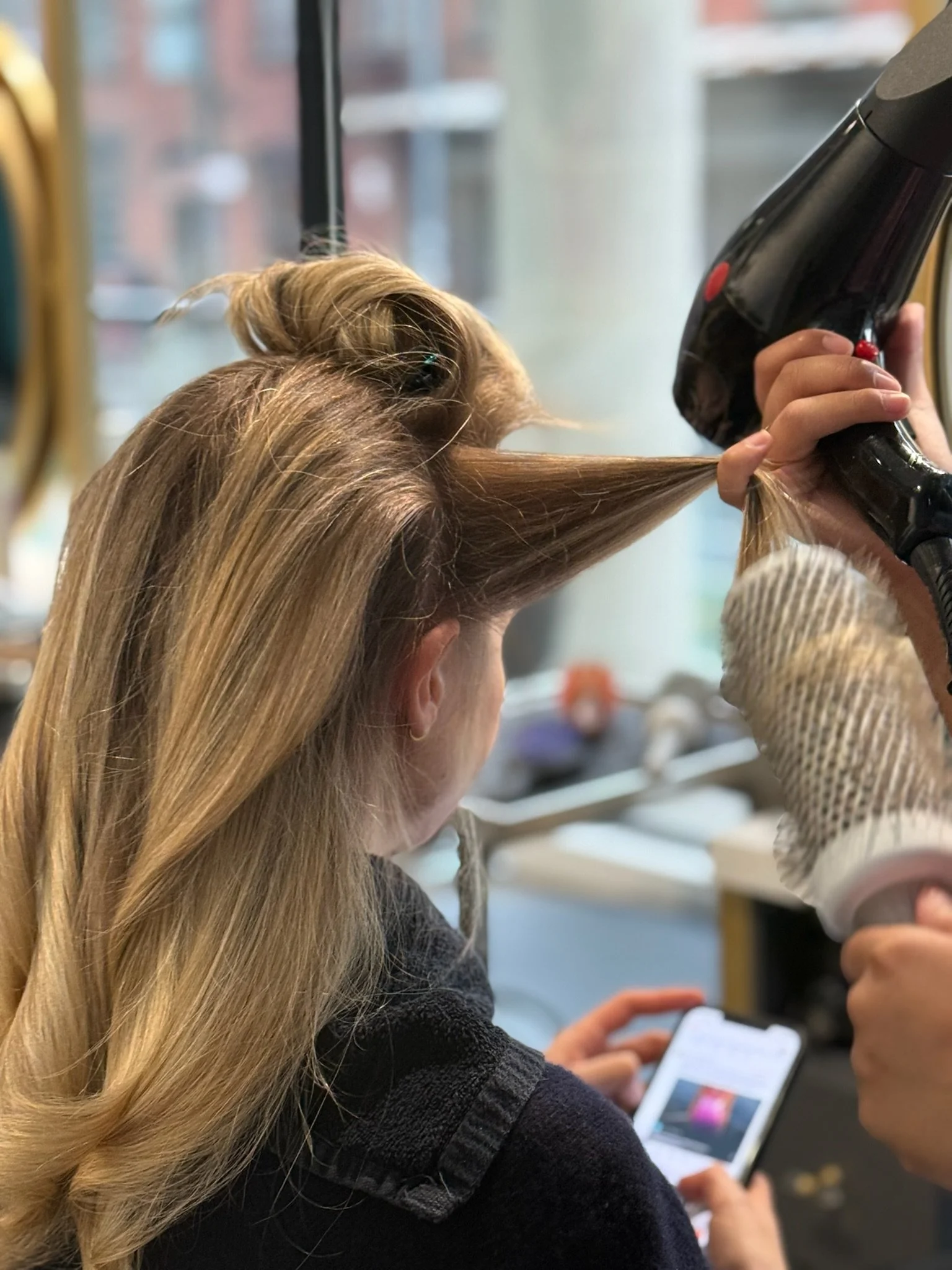 soft lived in blonde hair with natural dimension at Gem House Salon in Greenpoint Brooklyn low maintenance blonde NYC