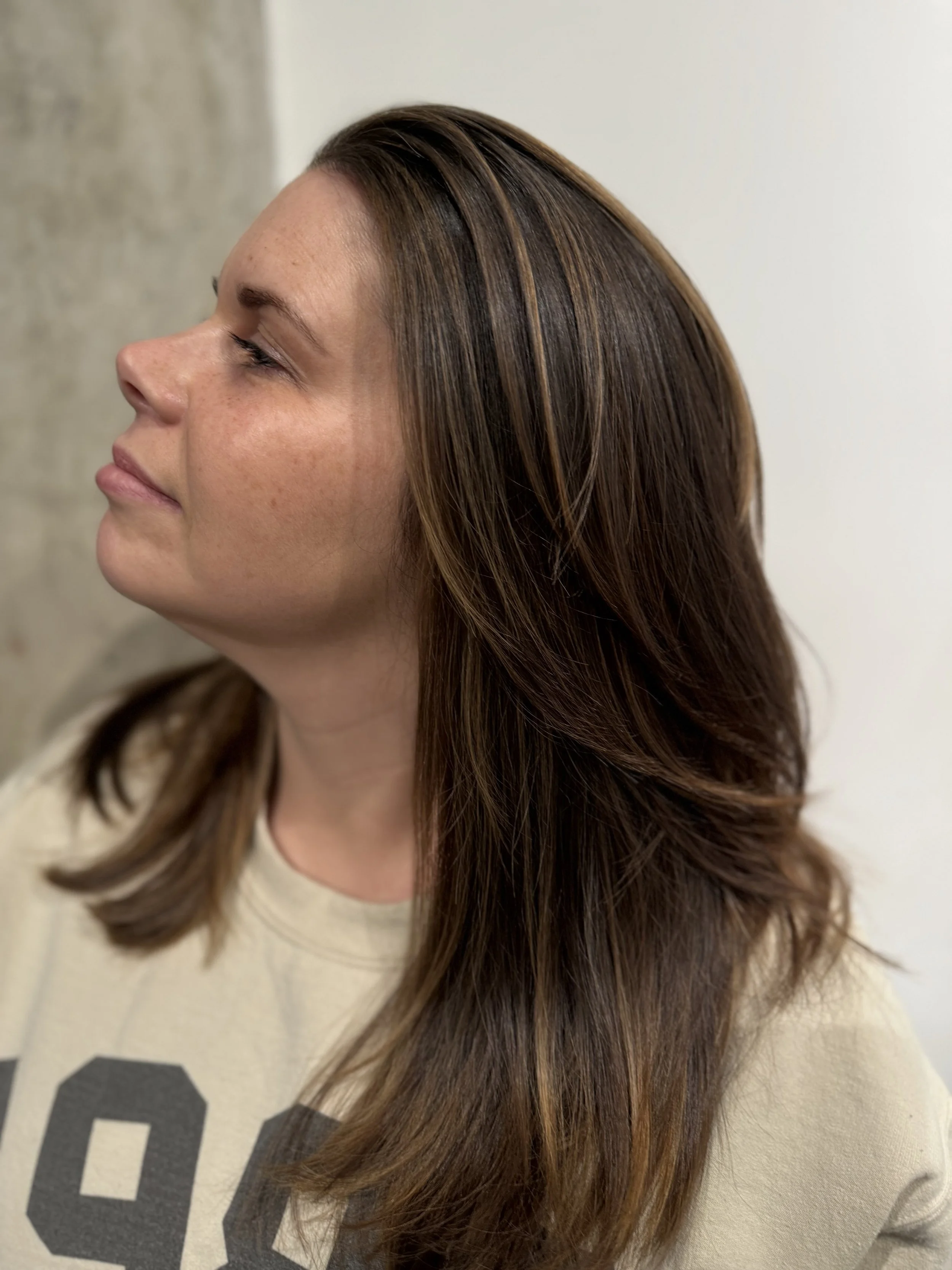 After photo of grey blending using balayage and lowlights for a soft, dimensional finish at a Greenpoint Brooklyn hair salon.