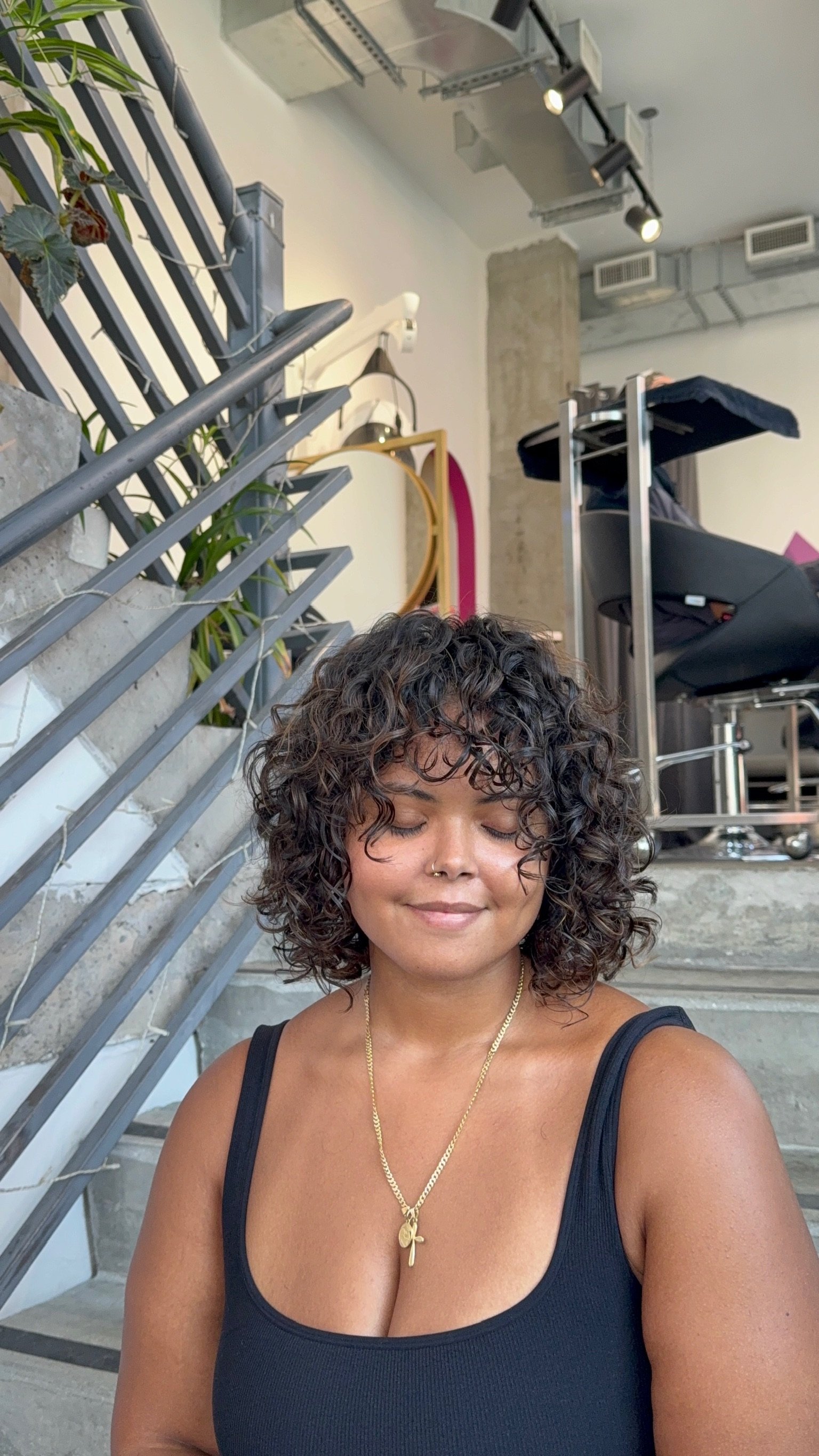Fall haircut with soft layers and face framing at Gem House Salon in Greenpoint Brooklyn