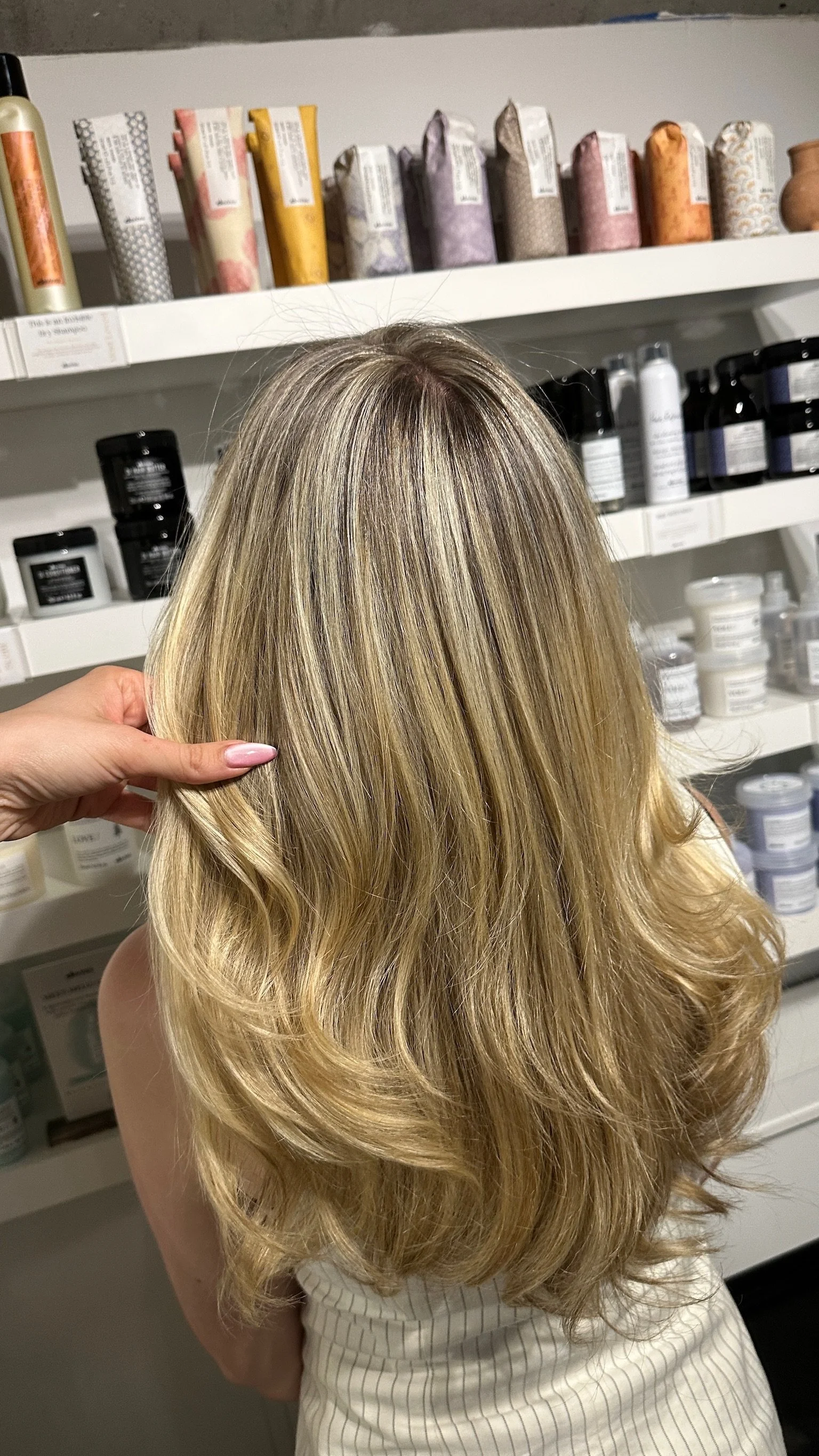 Creamy blonde highlights with soft dimension at Gem House Salon in Greenpoint Brooklyn.