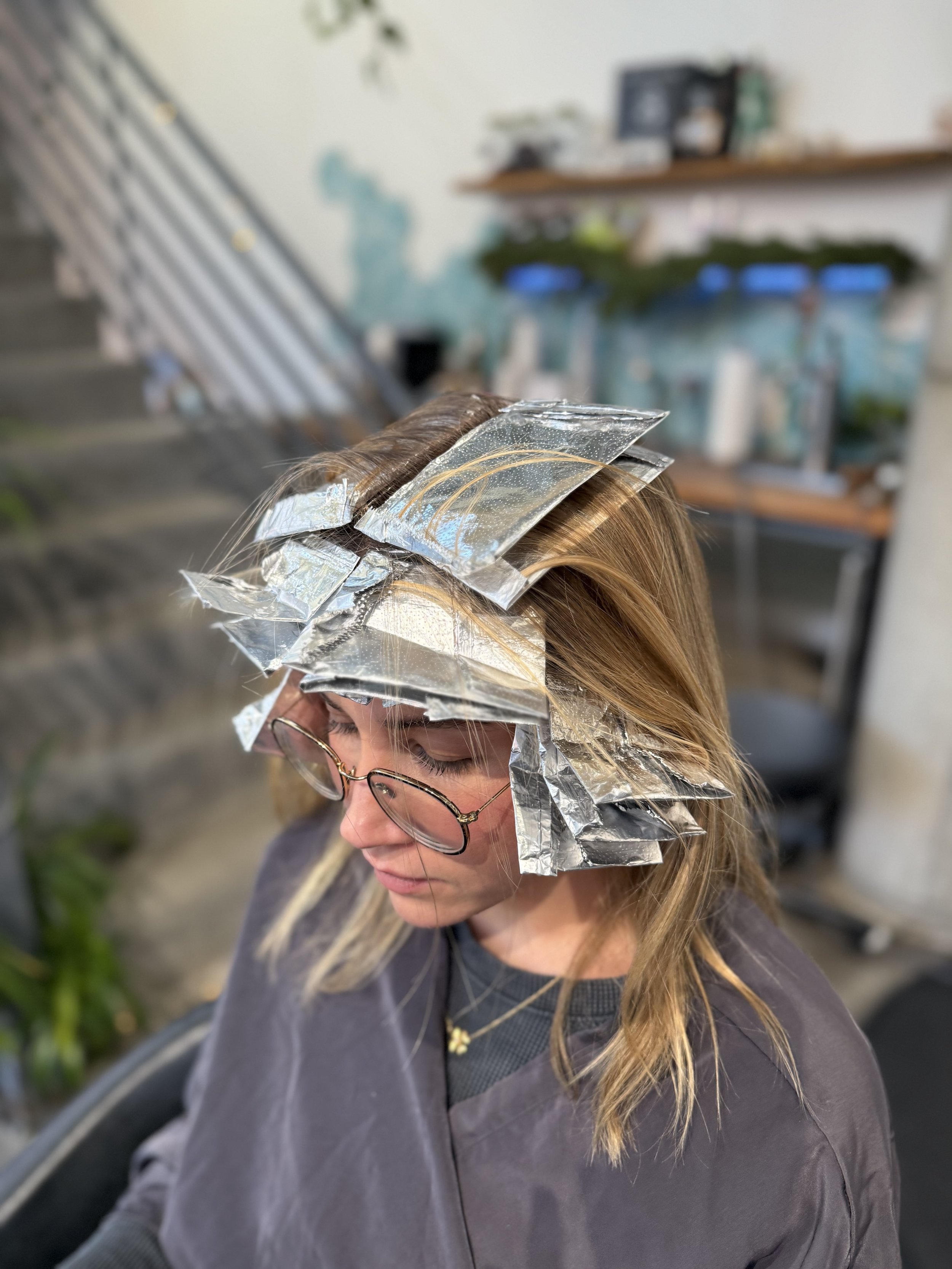 Creamy blonde highlights with soft dimension at Gem House Salon in Greenpoint Brooklyn.