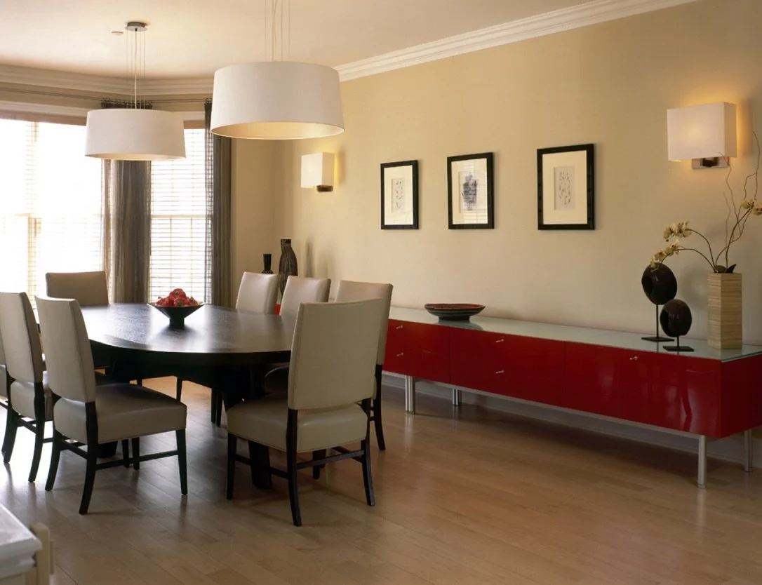 I always look back at past projects we have done to inspire future designs.

This dining room still feels current in a contemporary modern style. 

I love the play of the bold red high gloss lacquer sideboard, juxtaposed with the warm neutral palette