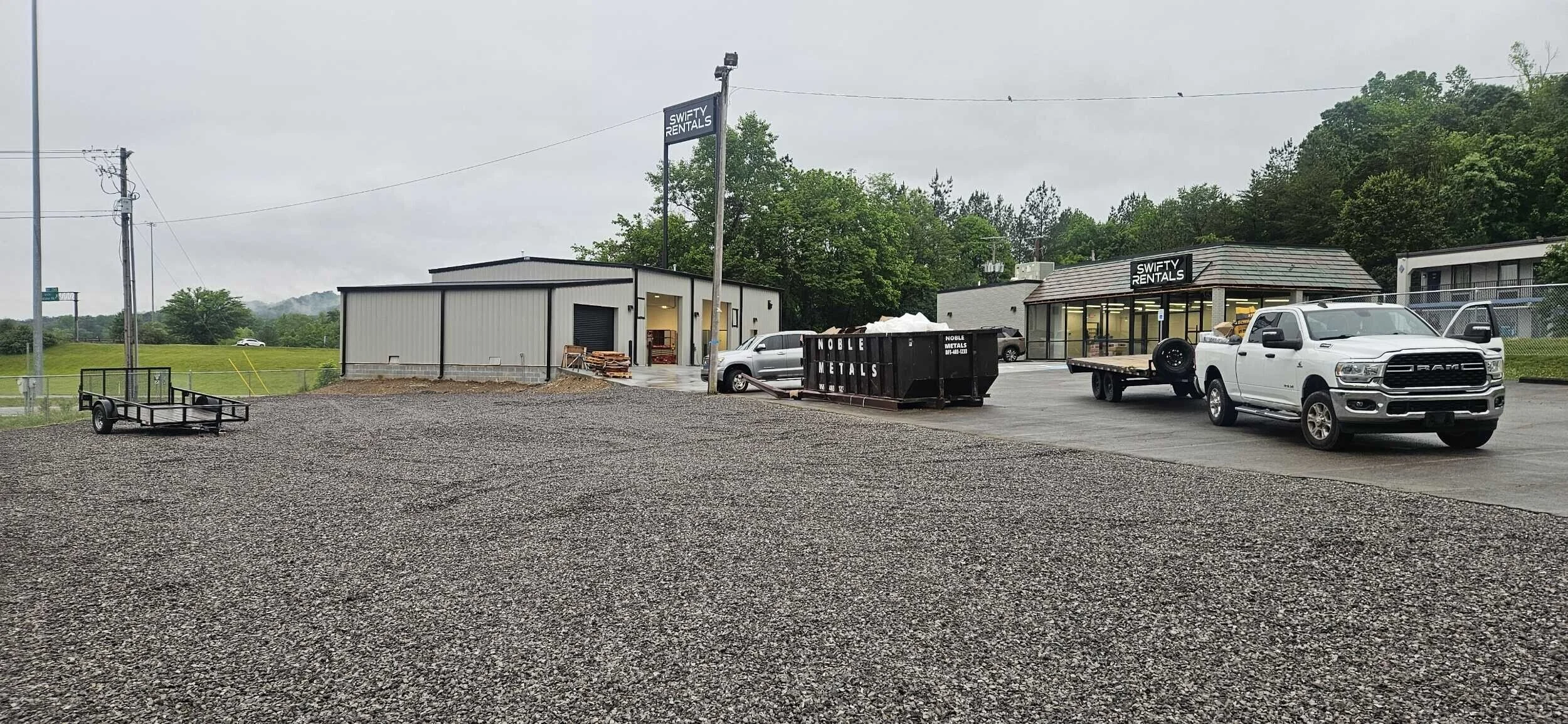 New construction design build retail project for tool rental facility. New pre-engineered metal building and sales building with brick and storefront facade. Asphalt and concrete paving. 