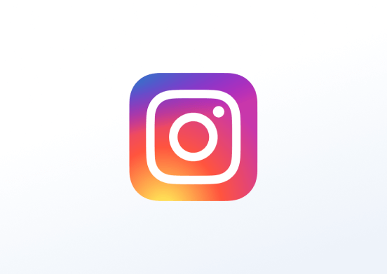 Instagram logo with a gradient of purple, pink, orange, and yellow on a light background.