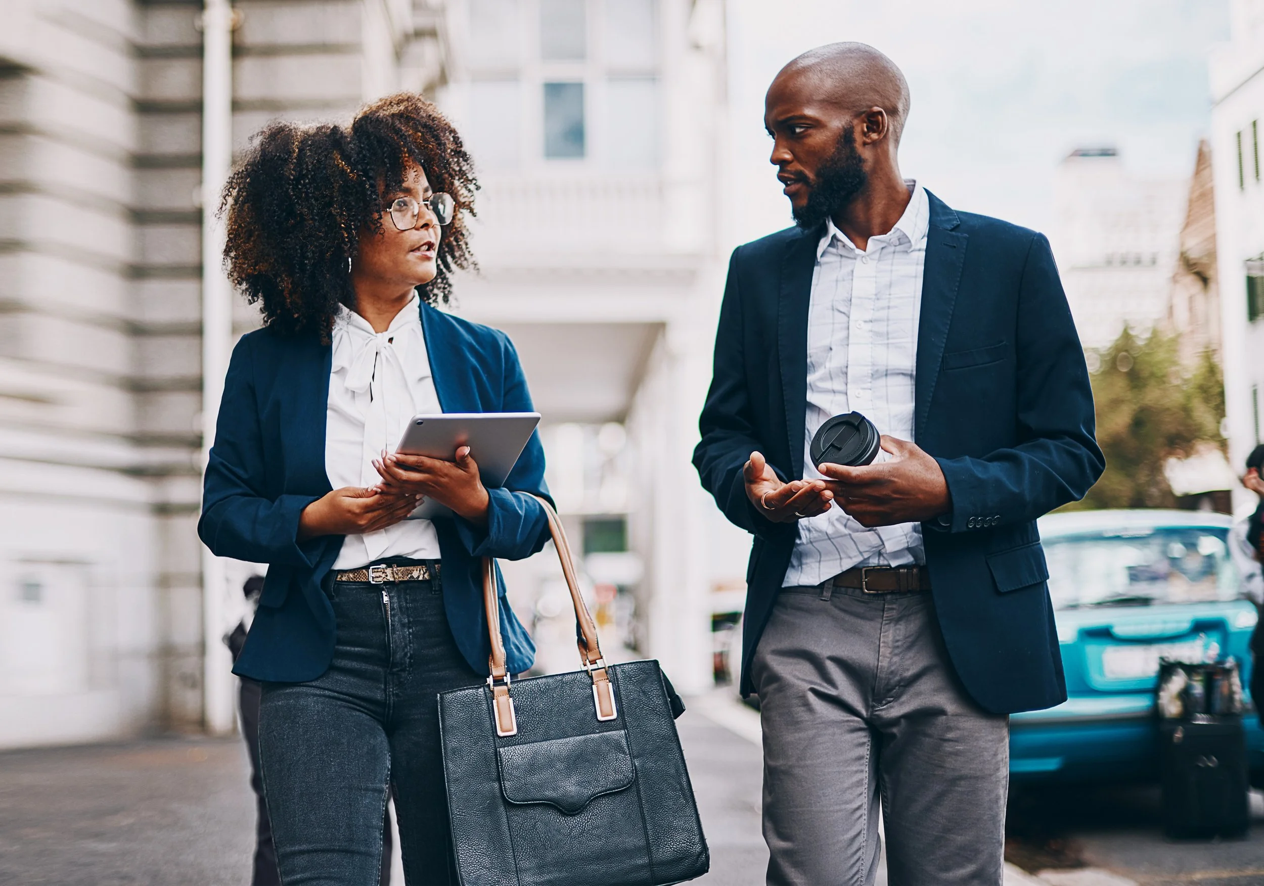 business-people-walking-city-with-talking-commute-travel-journey-conversation-finance-corporate-team-employees-sidewalk-discussion-planning-briefing-networking.jpg