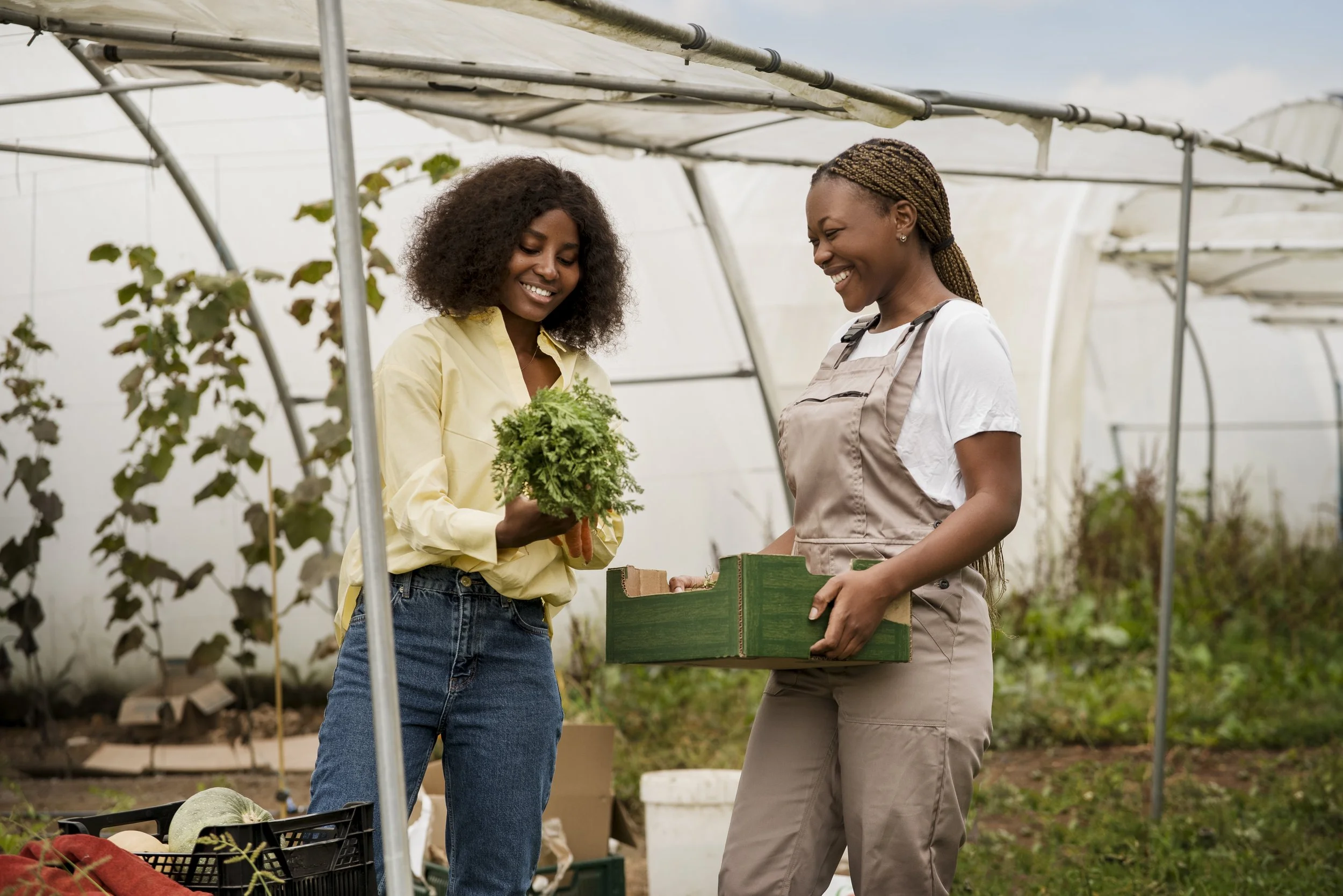 medium-shot-smiley-women-farming.jpg