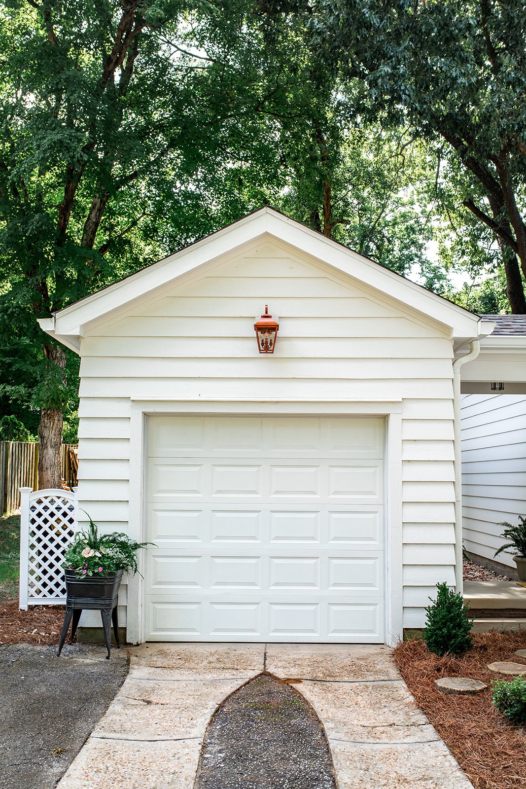 Attached single-car garage connected to the home by a breezeway