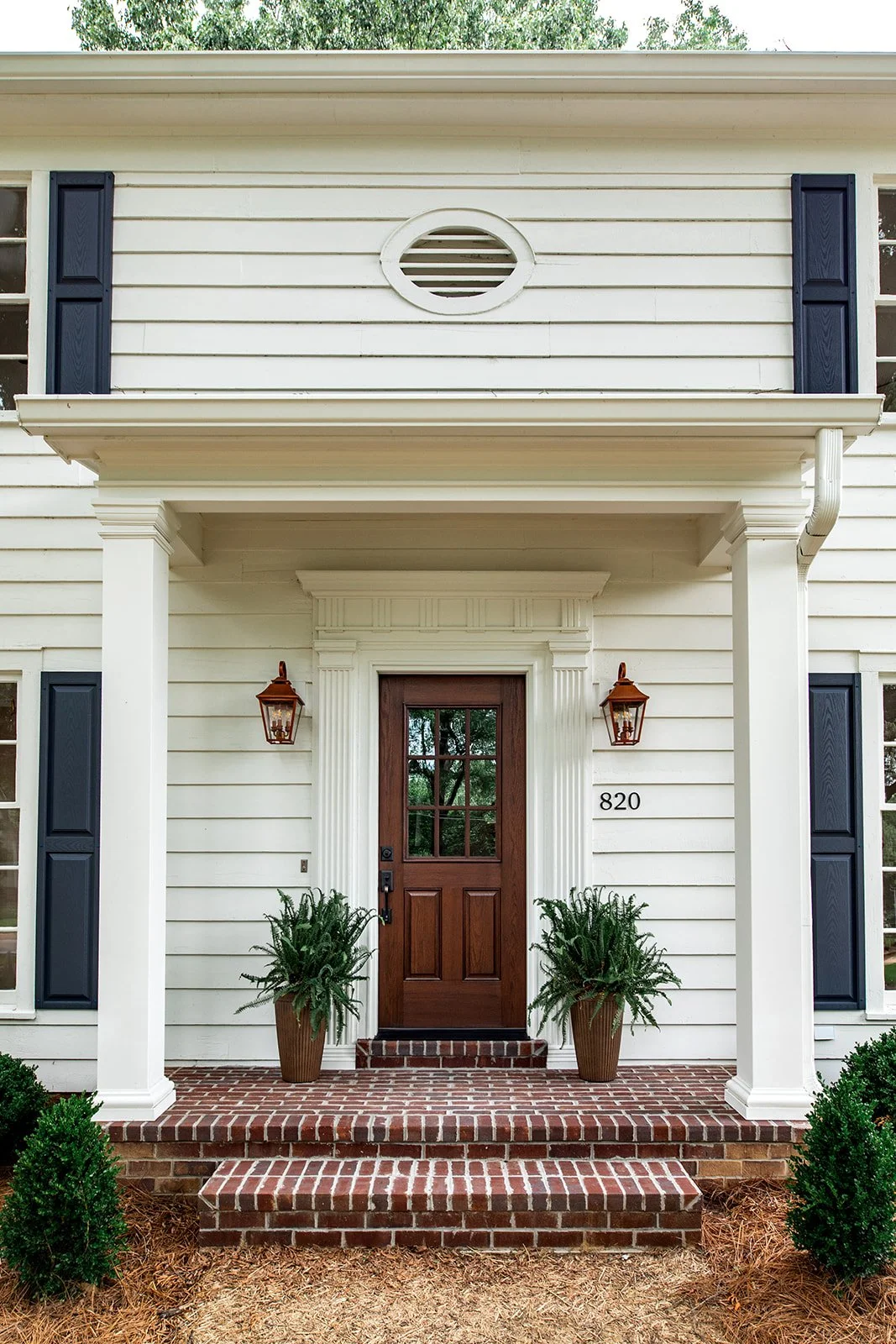New front porch and welcoming covered entry on a classic colonial