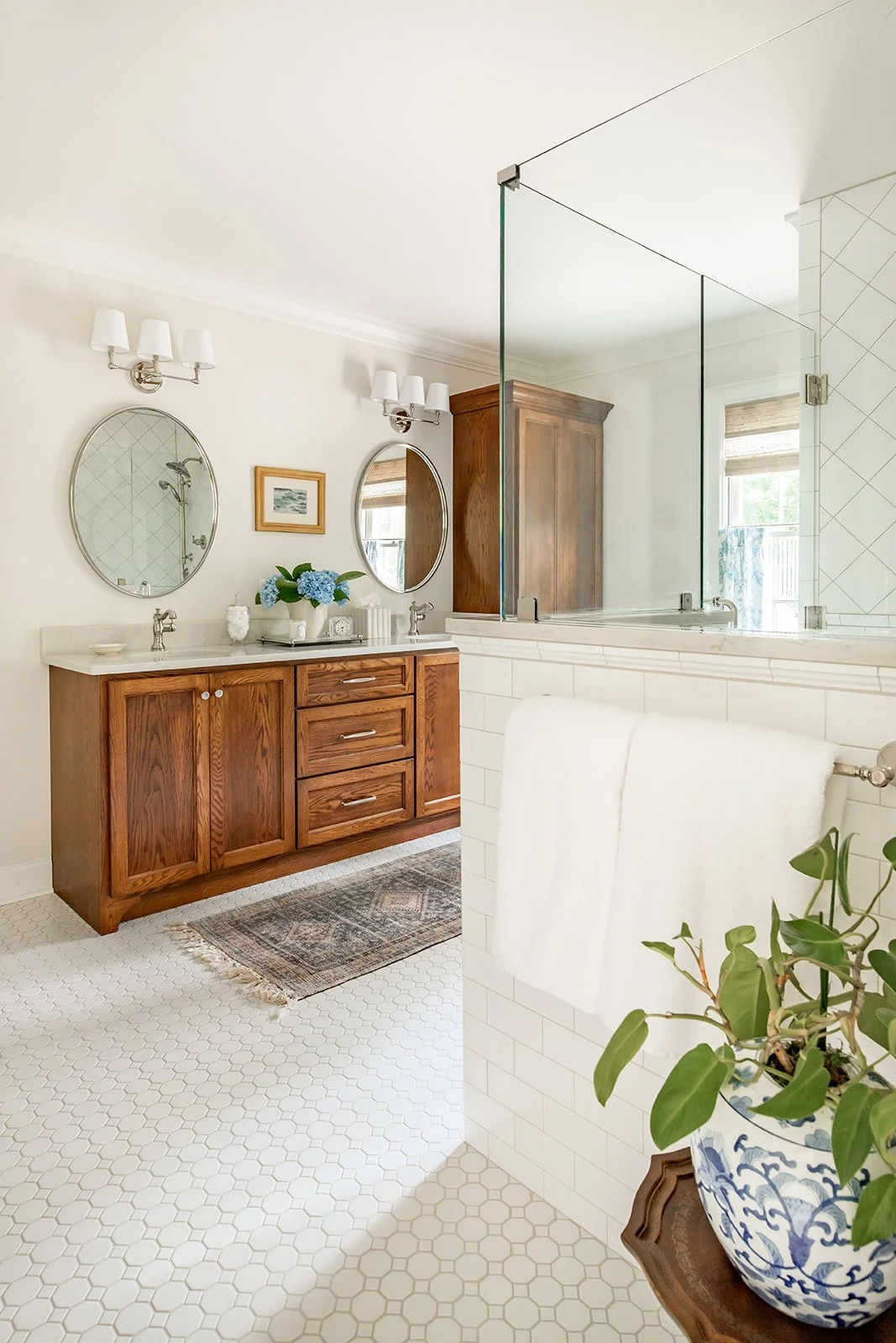 Master-bath double vanity with dual mirrors and designer lighting
