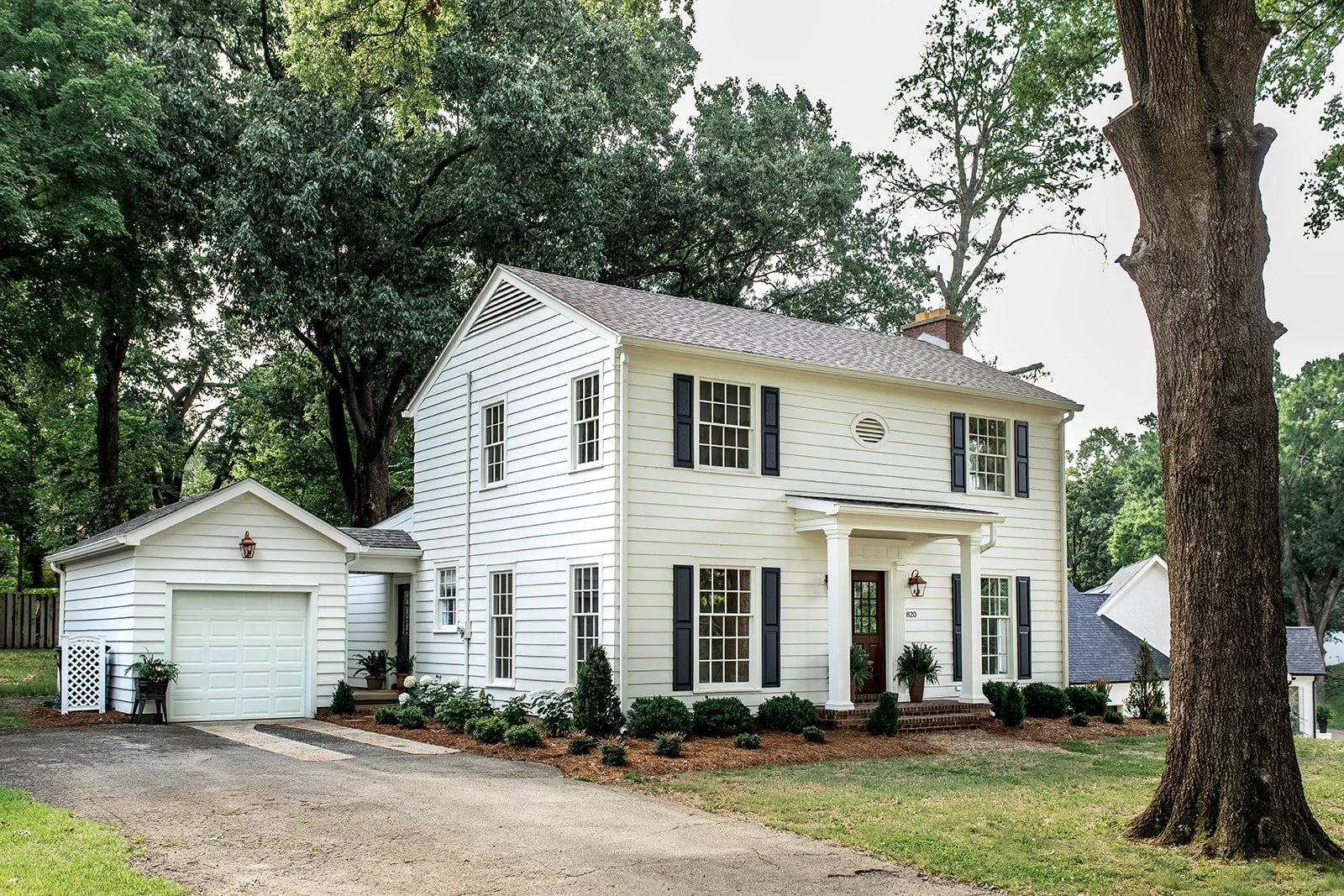 Shaded, established lot framed by mature oak trees