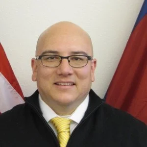 Nathan Ruybal, Clerk and Recorder smiles at the camera