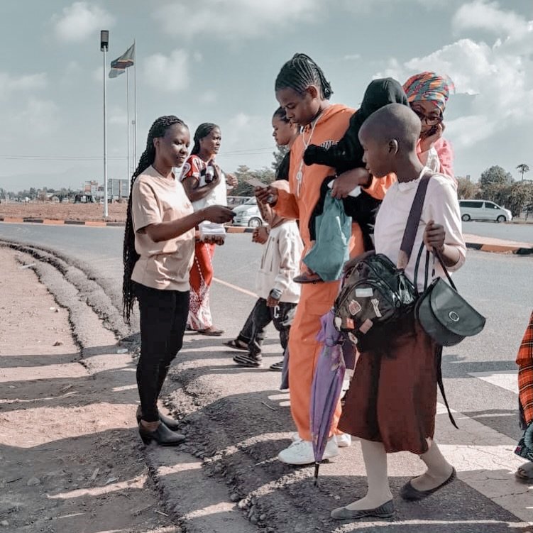 Meet our incredible USSD ambassador, engaging with the community at a zebra crossing and distributing flyers to encourage women to join our menstrual cycle tracking app! 

Every woman has the right to understand her cycle, own her health, and make in