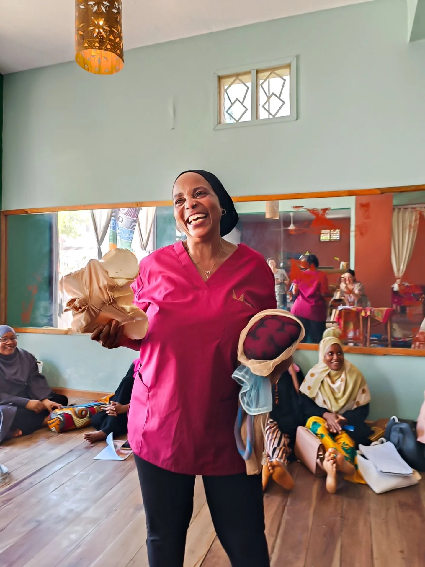 Meet Mahela - Mother, Midwife, Birth Keeper, Mwandamo Board Member, and Super Woman. 

At a workshop in Zanzibar, she&rsquo;s sharing her knowledge with midwives and traditional birth attendants. Her dedication shines through her infectious smile and