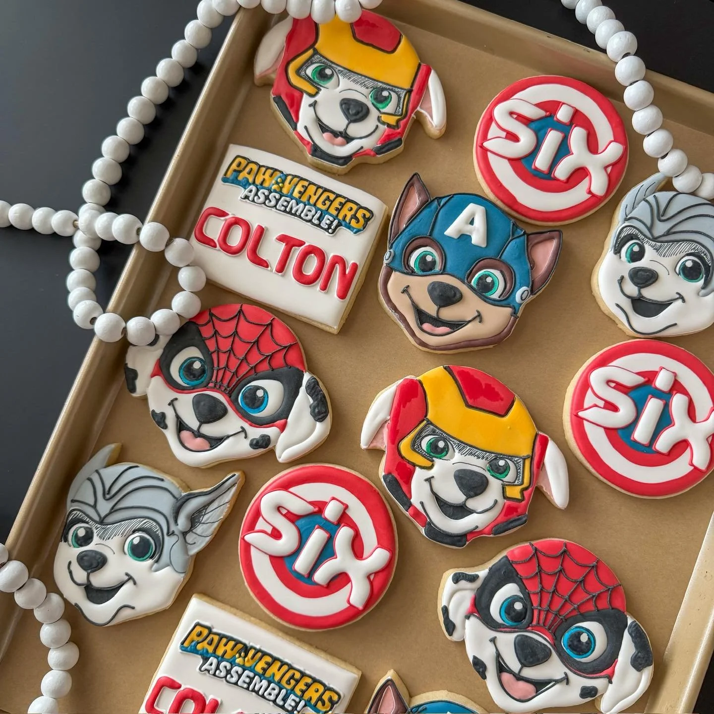 The crossover event we&rsquo;re here for! 
No job too big.
No cookie too detailed!
Paw Patrol is on a roll and assembled accordingly 🐾🦸&zwj;♂️🍪

#pawpatrol #pawpatrolparty #pawpatrolbirthday #avengers #avengerparty #avengerpartytheme #superheropar