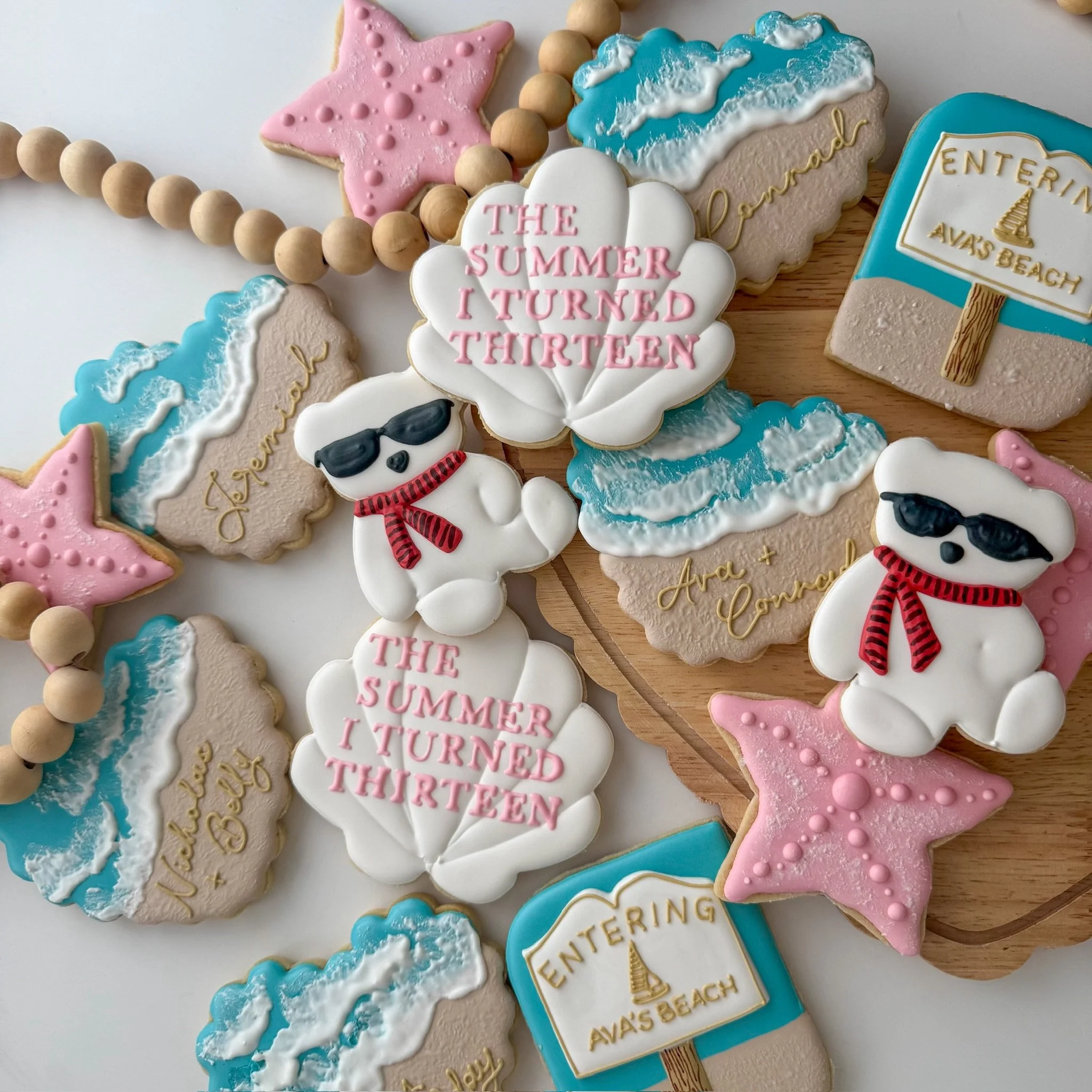 Everything good happens between June and a Cousins Beach state of mind 🌊🩷🍪 #thesummeriturnedpretty #tsitp #decoratedsugarcookies #customcookies #northcarolinacookier