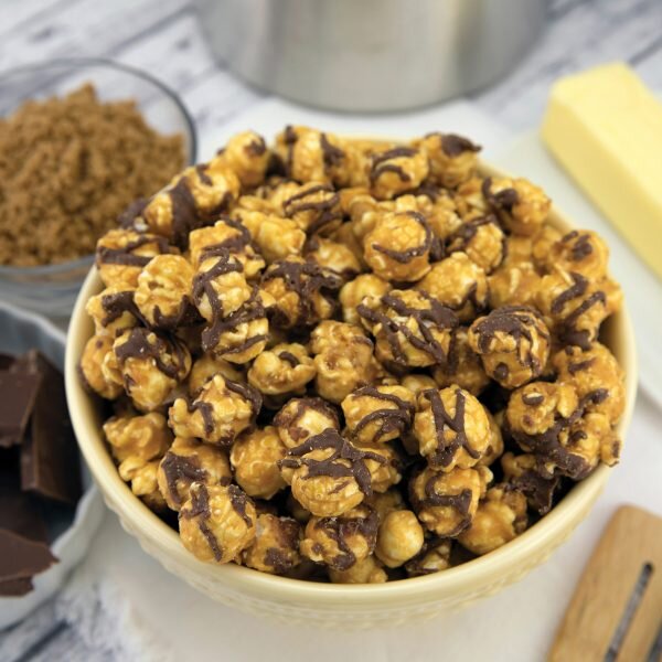 CHOCOLATE DELIGHT-
Our rich and buttery caramel corn, drizzled with milk chocolatey goodness! A chocolate lover’s dream! Gluten Free.