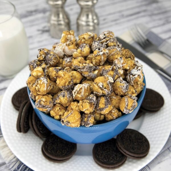 COOKIES AND CREAM-
We’ve taken our Signature Cookies & Cream Popcorn to a whole new level. The taste of chocolate cookies gets even better when they’re gently tossed with freshly glazed white chocolate and popcorn. Cookies get a bit o’ glaze, popcorn
