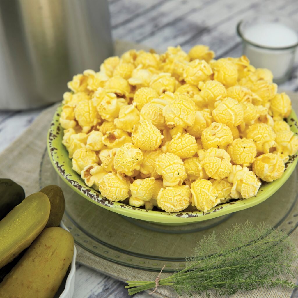 DILL PICKLE-
If you love the crunchy experience of fresh dill pickles, you’ll love our new Dill Pickle popcorn. Just as satisfying as a jumbo dill pickle straight from the barrel. Pickle lovers everywhere crave it! Gluten Free.