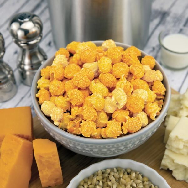 THREE CHEESE-
Cheese Lover's Beware! Bite after fluffy, crispy bite, our 3 cheese is guaranteed to satisfy the cravings of even the most sophisticated cheddar connoisseurs. Each bag is mixed with our Cheesy Cheddar, White Cheddar and Sour Cream Popco