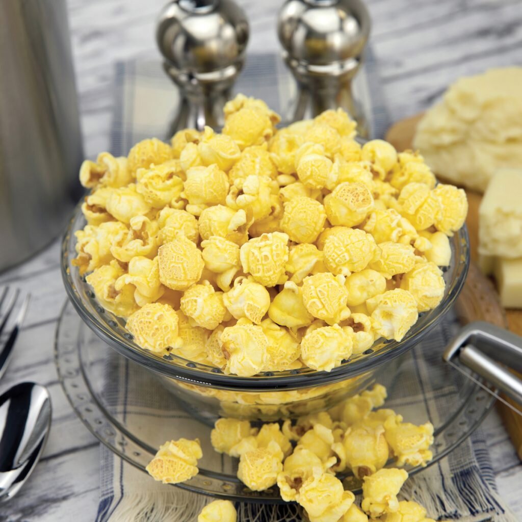WHITE CHEDDAR-
Our special blend of creamy white cheddar coats every inch of our fluffy white popcorn, so no bite lacks in cheesiness. Leaving your mouth in a state of complete and utter elation. Gluten Free.