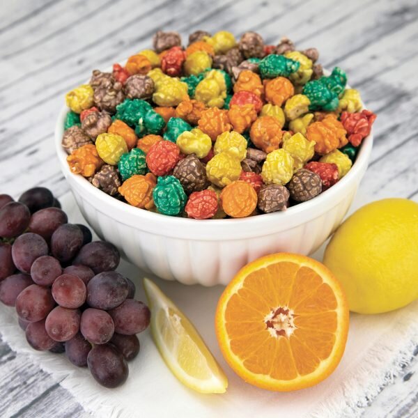 FRUITY-
A favorite with kids! So much color, so much flavor, so much fun. Our Fruity popcorn brings the colors of the rainbow and the flavors of grape, lemon, orange, blue raspberry and cherry in a light, crunchy coating. It’s a treasure hunt in ever