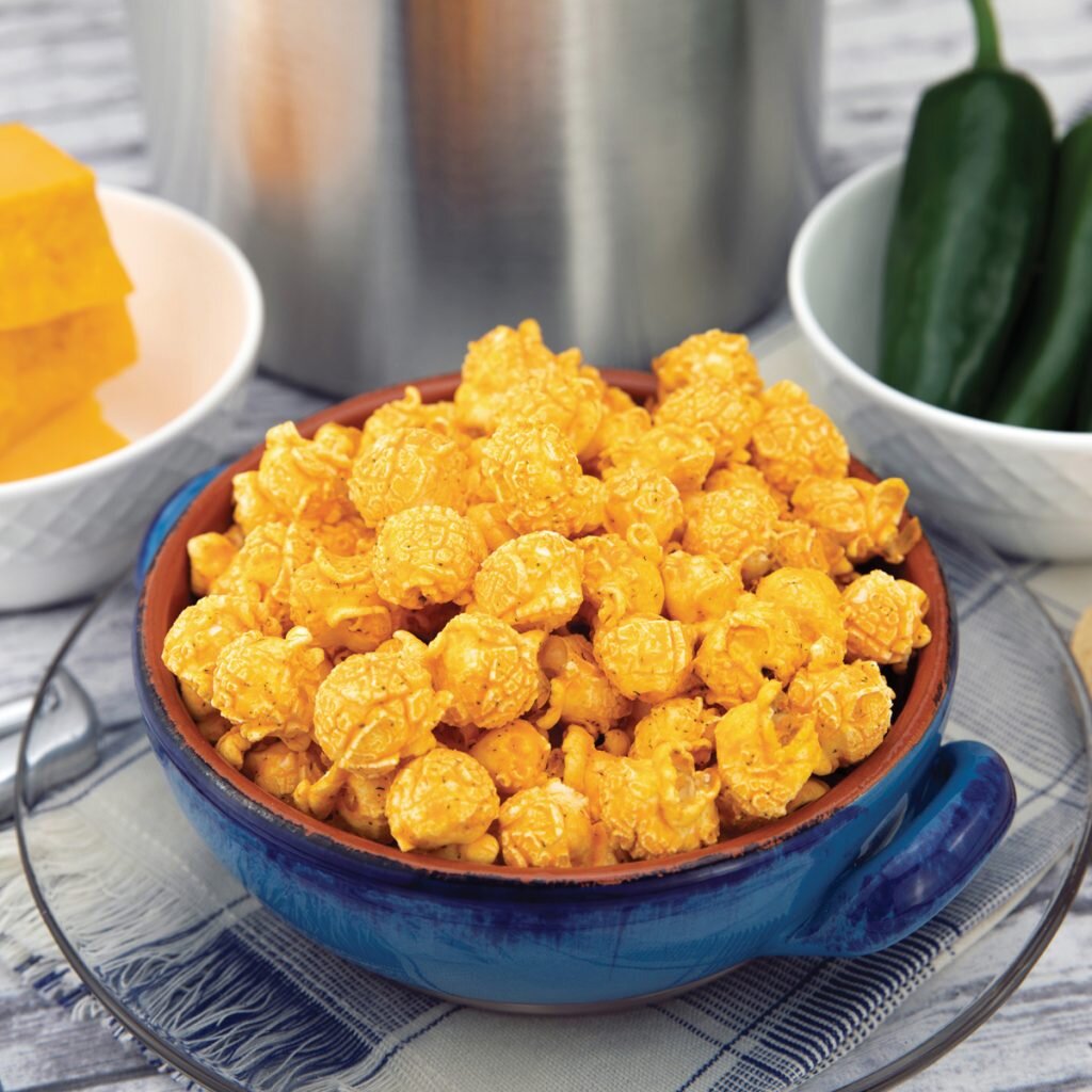 CHEDDAR JALAPEÑO-
A delicious popcorn with a kick of the southwest! Our secret duo of cheddar cheese combined with a touch of jalapeño delivers a bold flavor with just the right amount of heat! AWESOME! Gluten Free.