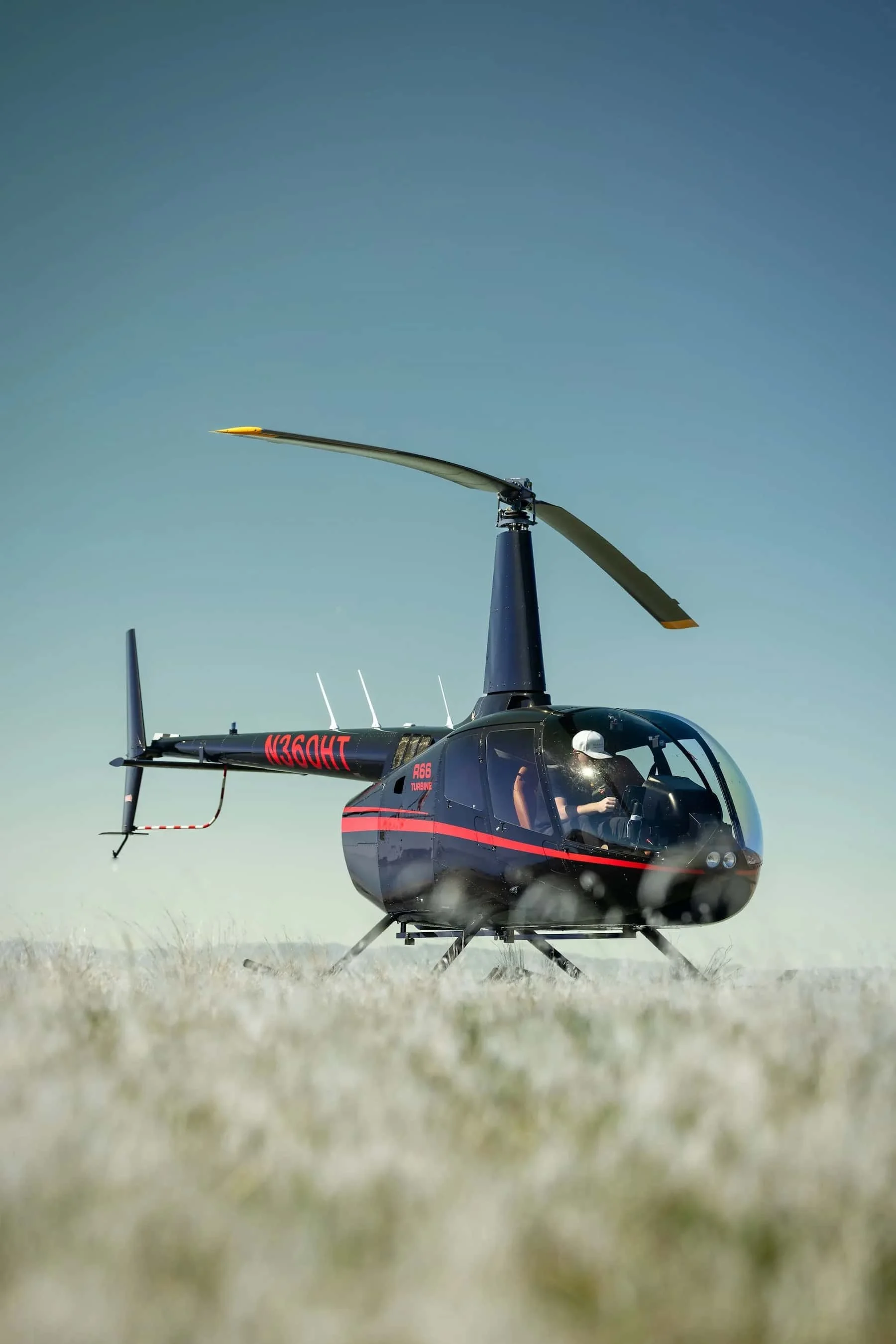 helicopter tours in utah USA	Parker Helicopters Robinson R66 ready for departure near Salt Lake City