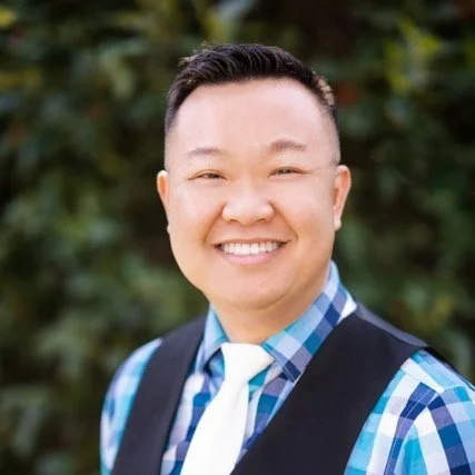 Quoc Lam Outside Smiling