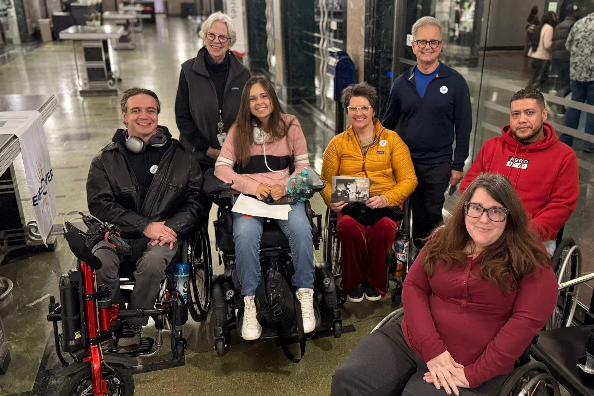 A group of folks, some in wheelchairs, at the Frist Art Museum.