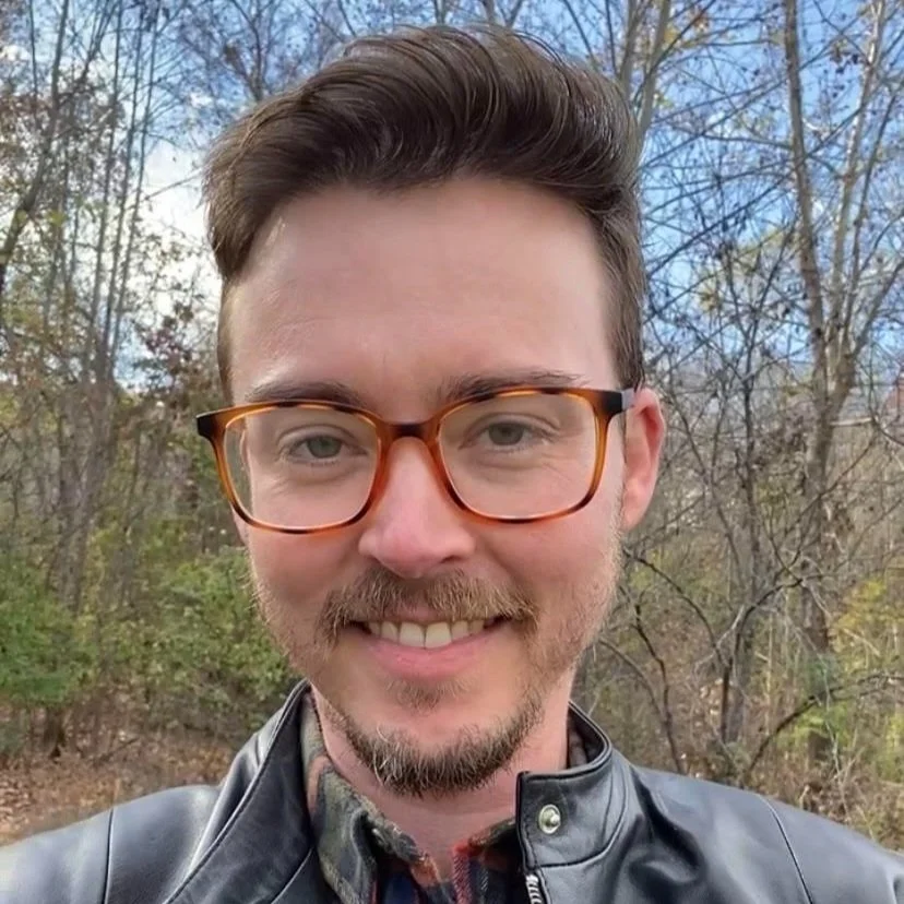 Dan Dumont smiling outdoors