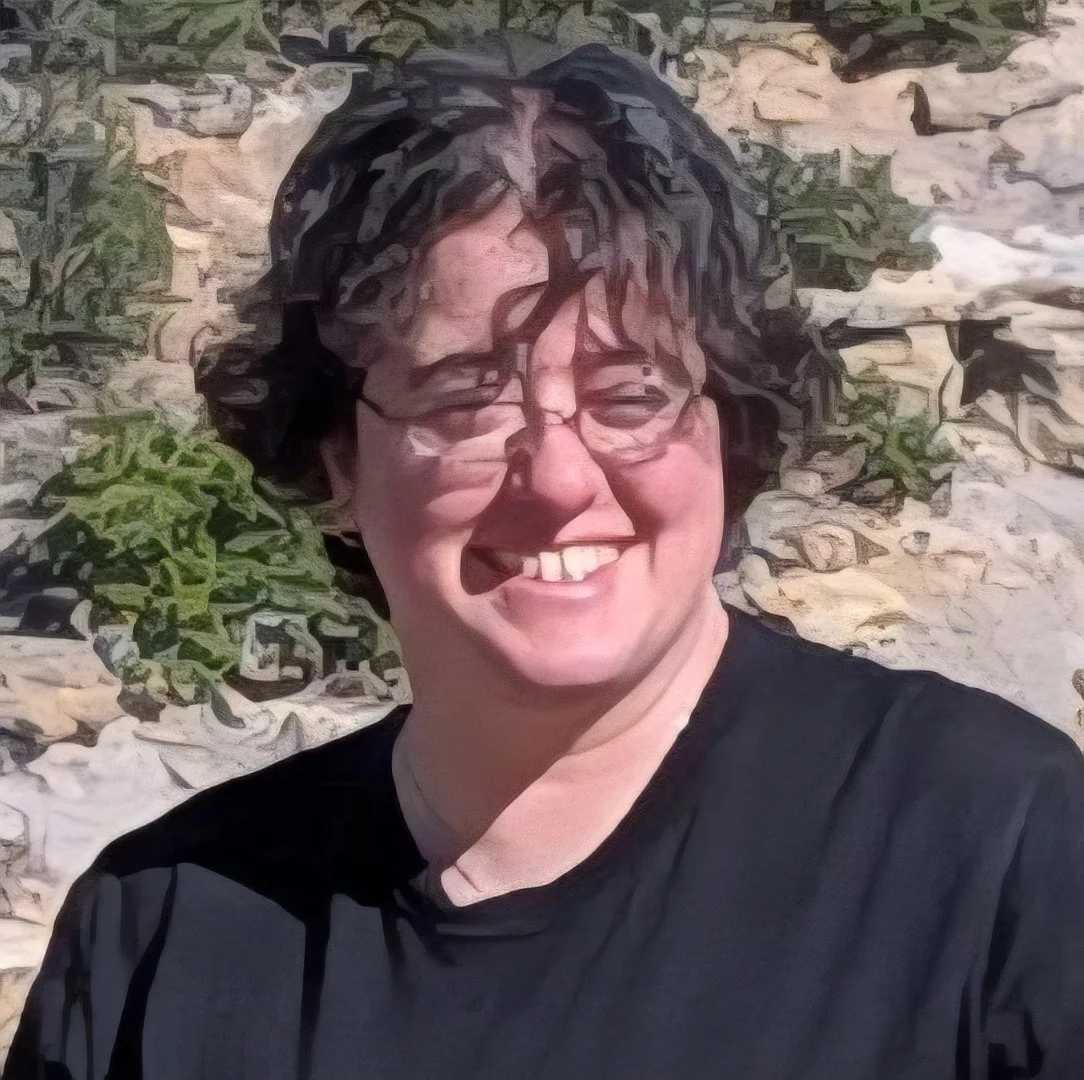 Kim Aronstam smiling outdoors