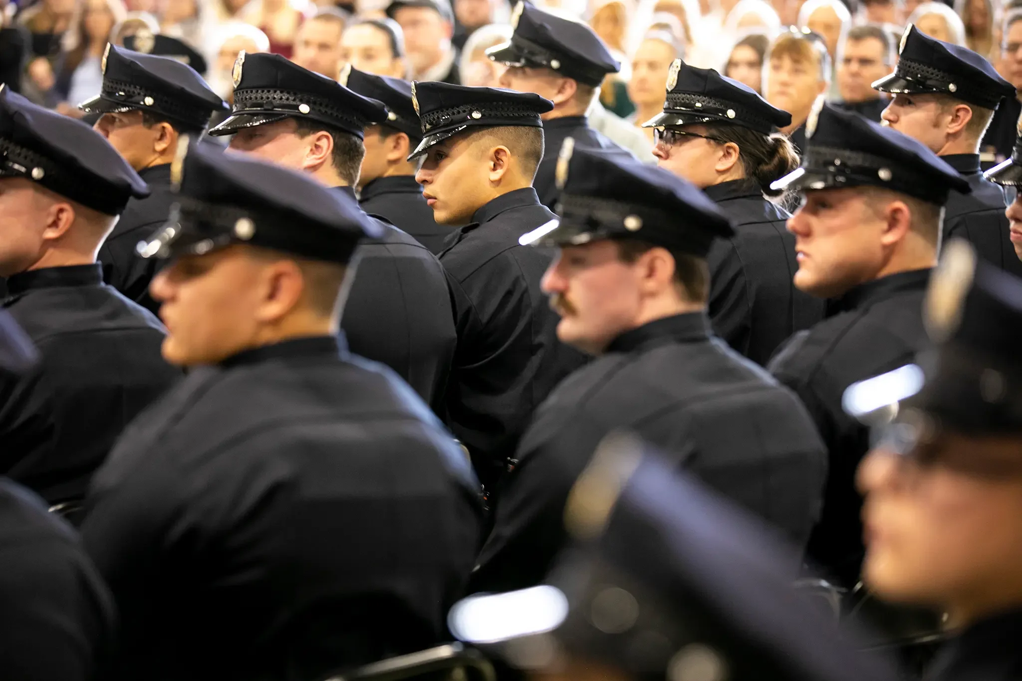 A class of cadets graduate from the Denver Police Academy in Central Park. March 31, 2023.