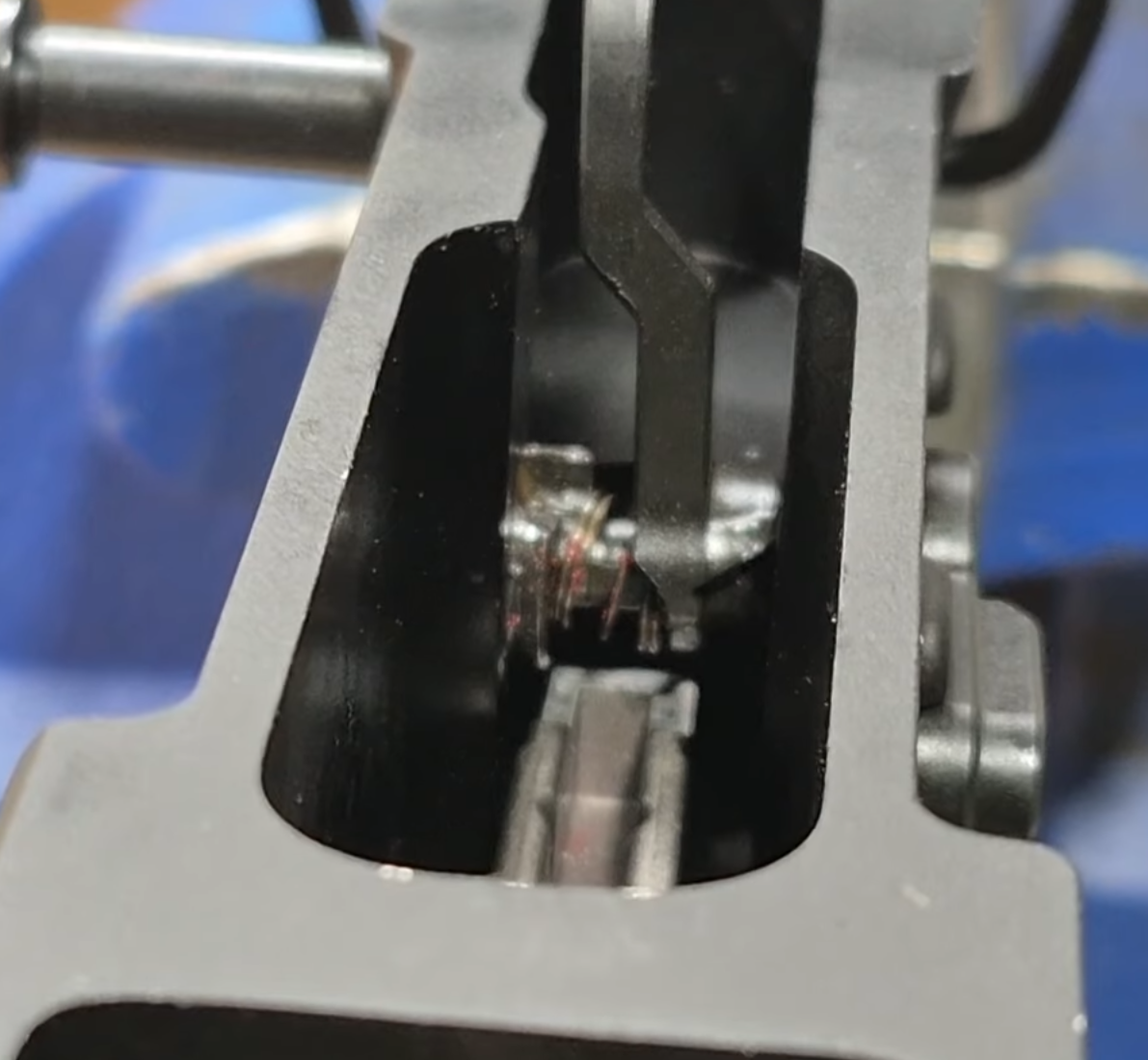 Close-up of a mechanical clearance requires for super selector to function properly in the forced reset position.